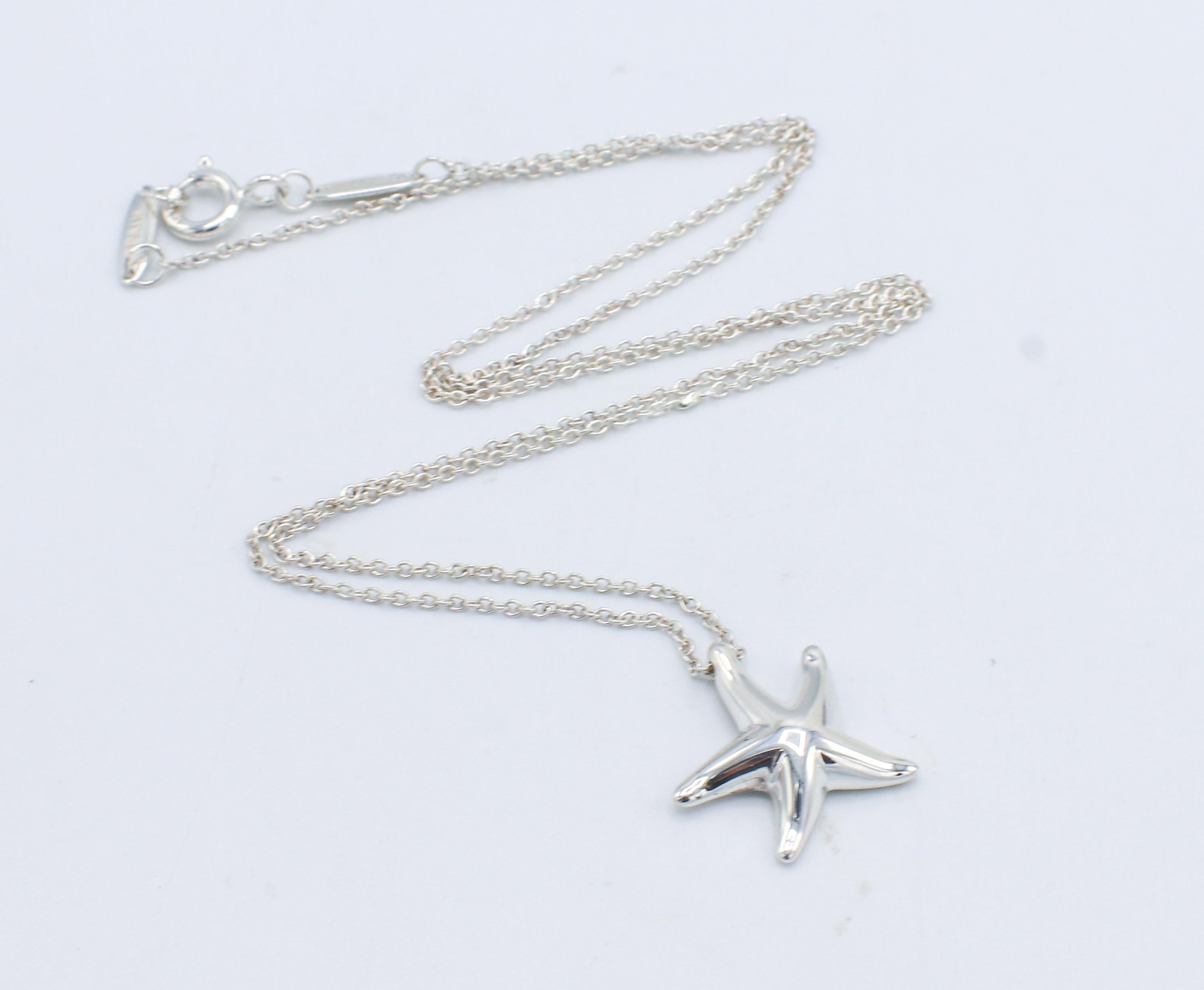 Tiffany & Co. Elsa Peretti Sterling Silver Starfish Pendant Necklace 
Metal: Sterling silver
Weight: 2.86 grams
Pendant: 14 x 14.5mm
Chain length: 16 inches
Retail: $350
