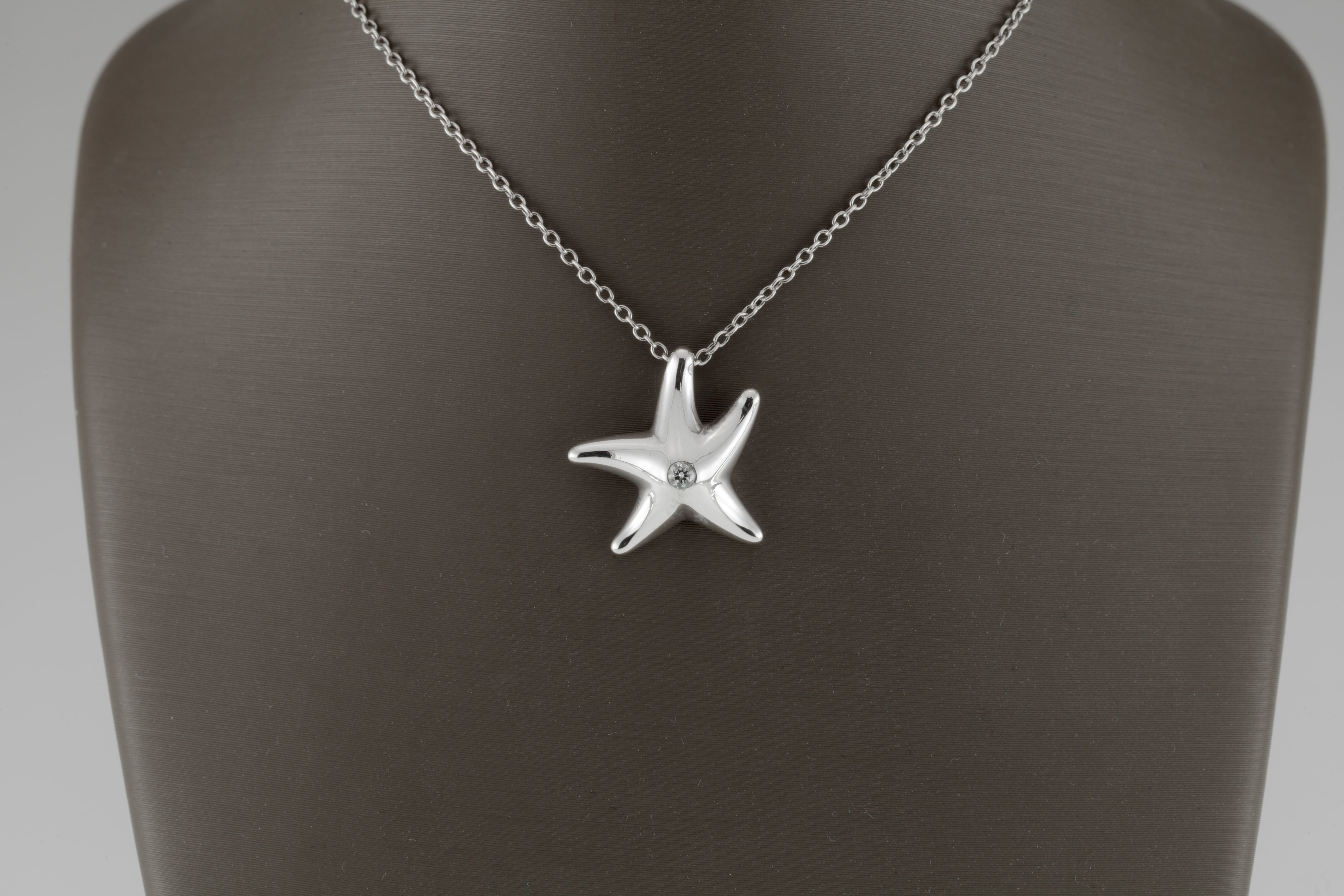 Beautiful Starfish Pendant by Elsa Peretti
Single Diamond Accent
Includes 16