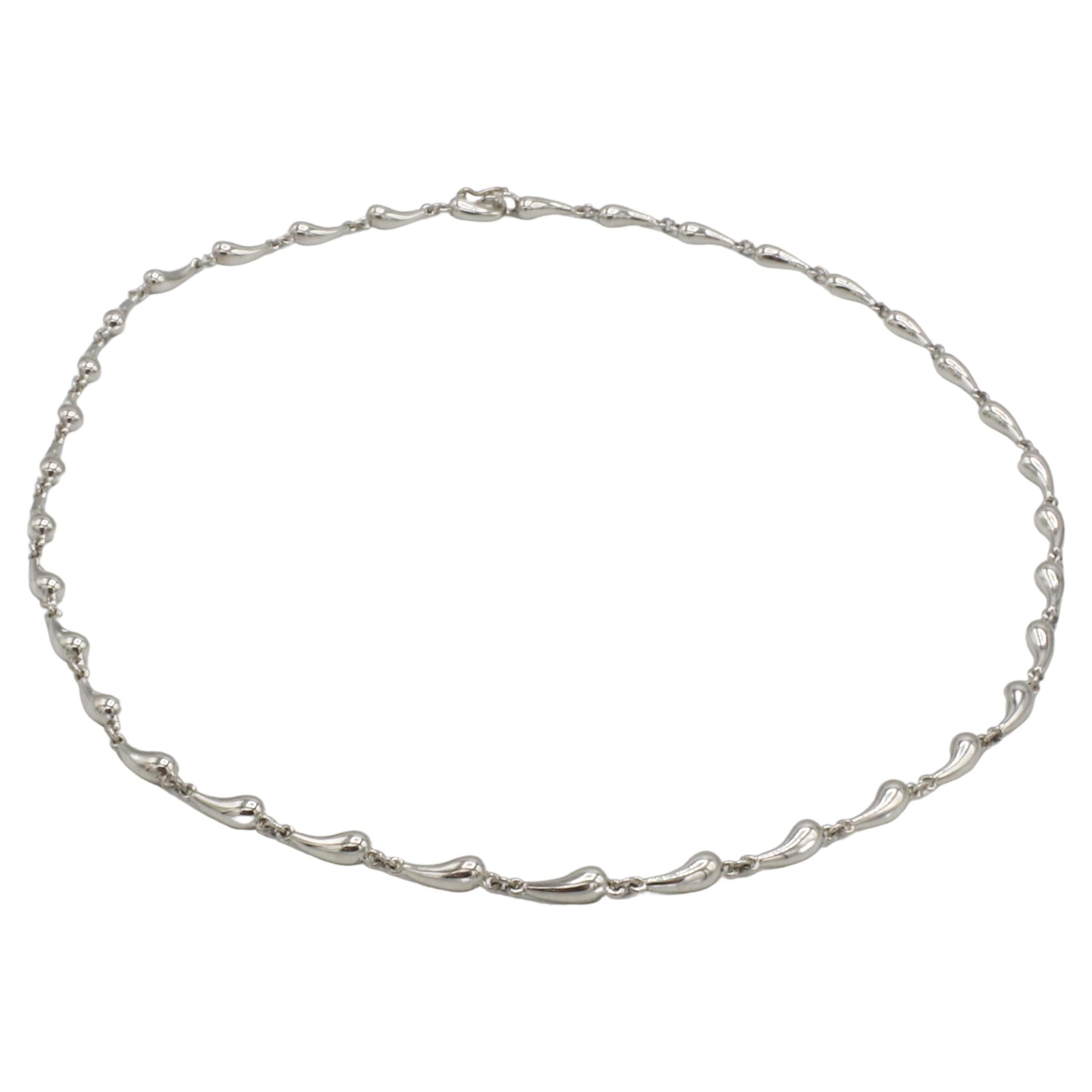 Tiffany & Co. Elsa Peretti Sterling Silver Tear Drop Chain Link Necklace 
Metal: Sterling silver 925
Weight: 16.8 grams
Length: 16 inches
