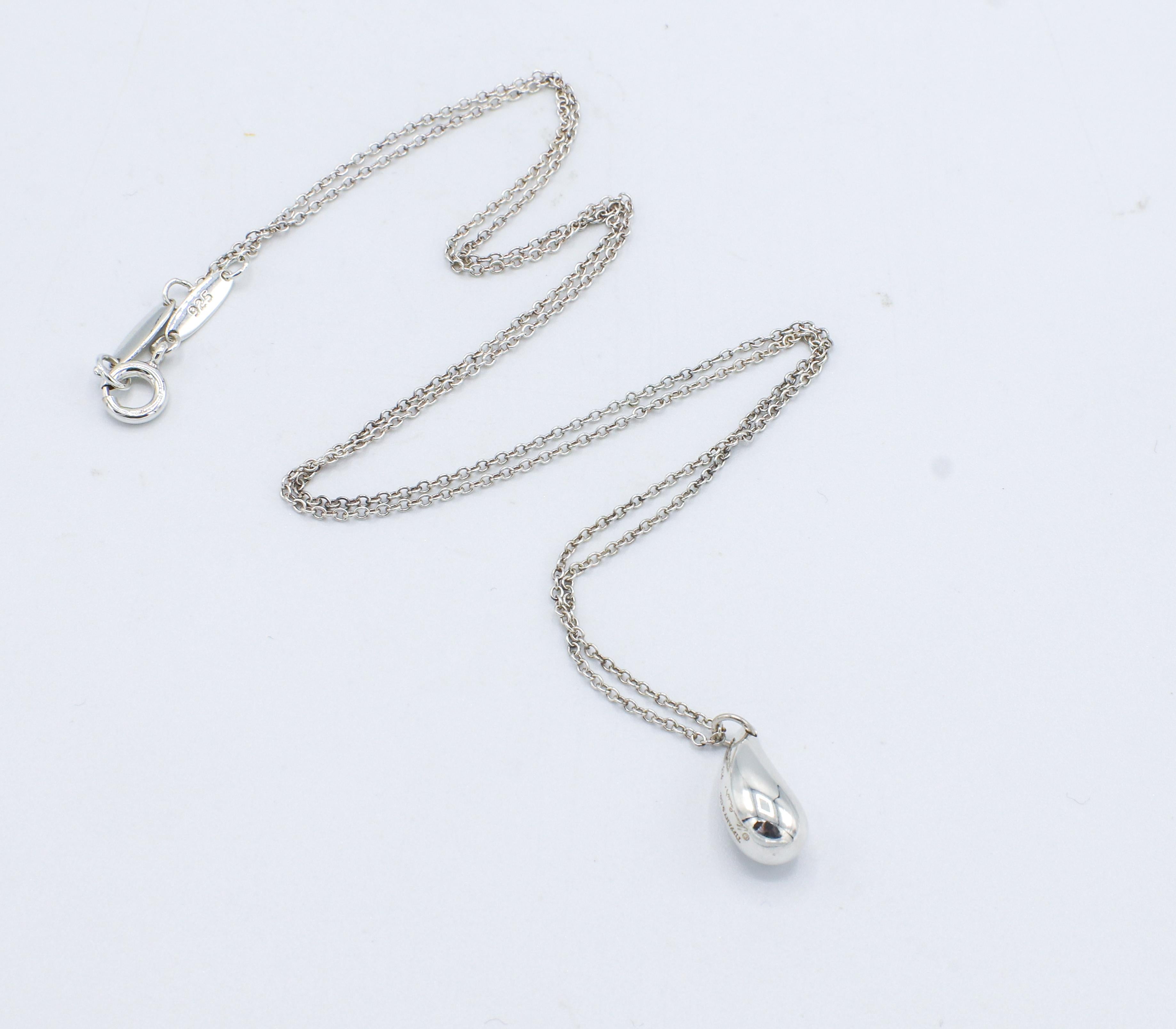 Tiffany & Co. Elsa Peretti Sterling Silver Teardrop Pendant Necklace 
Metal: Sterling silver
Weight: 3.33 grams
Pendant: 12 x 6mm
Chain: 18 inches
Retail: $275 USD

