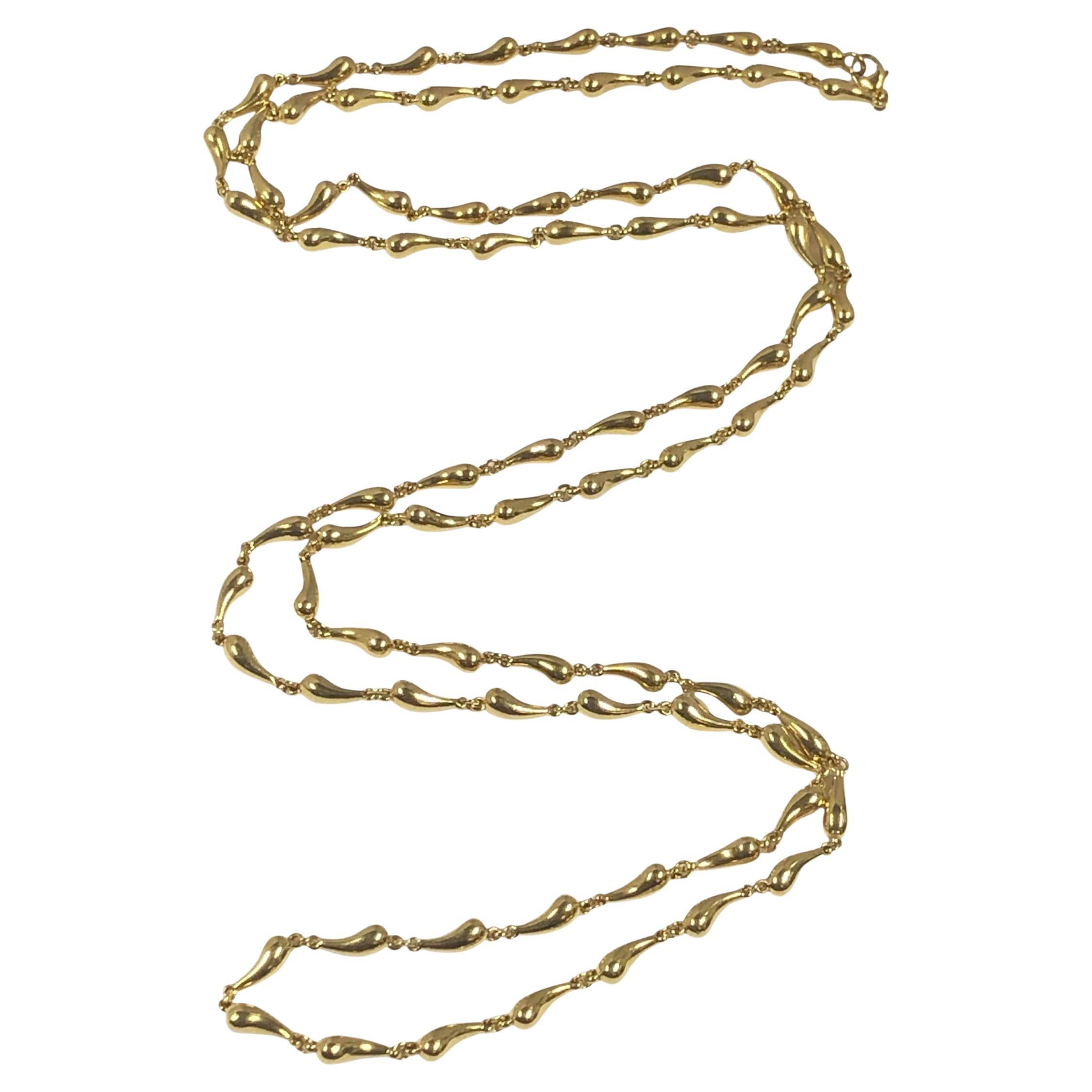 Tiffany 
Co. Elsa Peretti - Collier en or jaune avec gouttes d
eau en forme d
opéra en vente