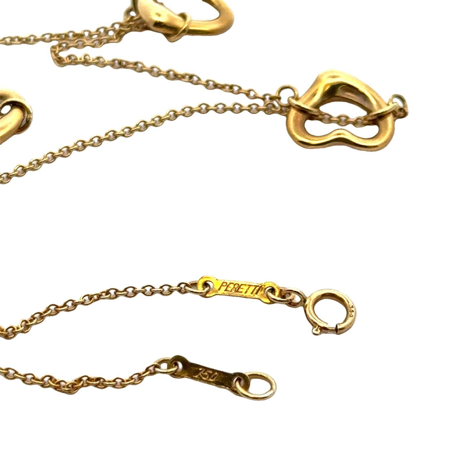 Tiffany & Co. Elsa Peretti Three Open Heart 18K Yellow Gold Pendant Necklace In Excellent Condition In Boca Raton, FL