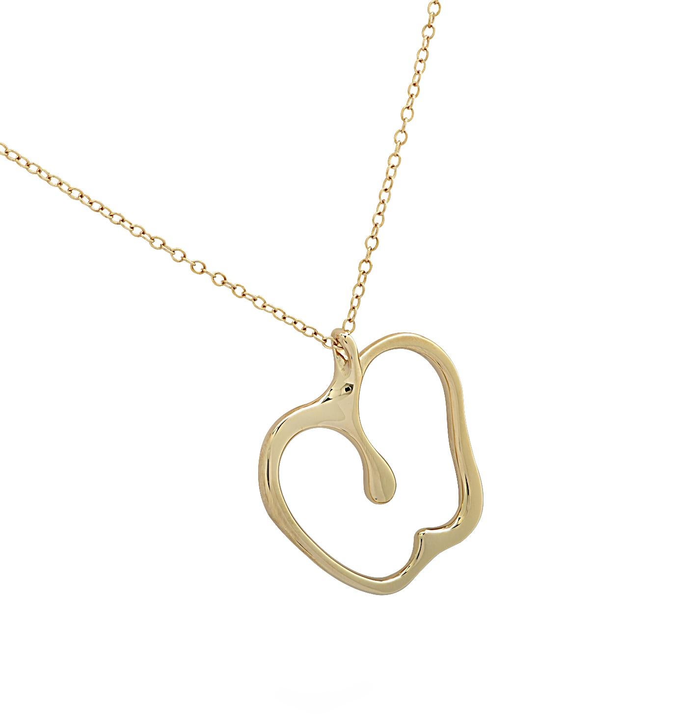 Bite into another fresh and crisp design from Elsa Peretti and Tiffany & Co. featuring an apple suspended from a 30 inch chain. The apple pendant signed Peretti, 18k and Tiffany & Co measures 1.2 inches by 1.25 inches. Since 1974, Elsa Peretti has