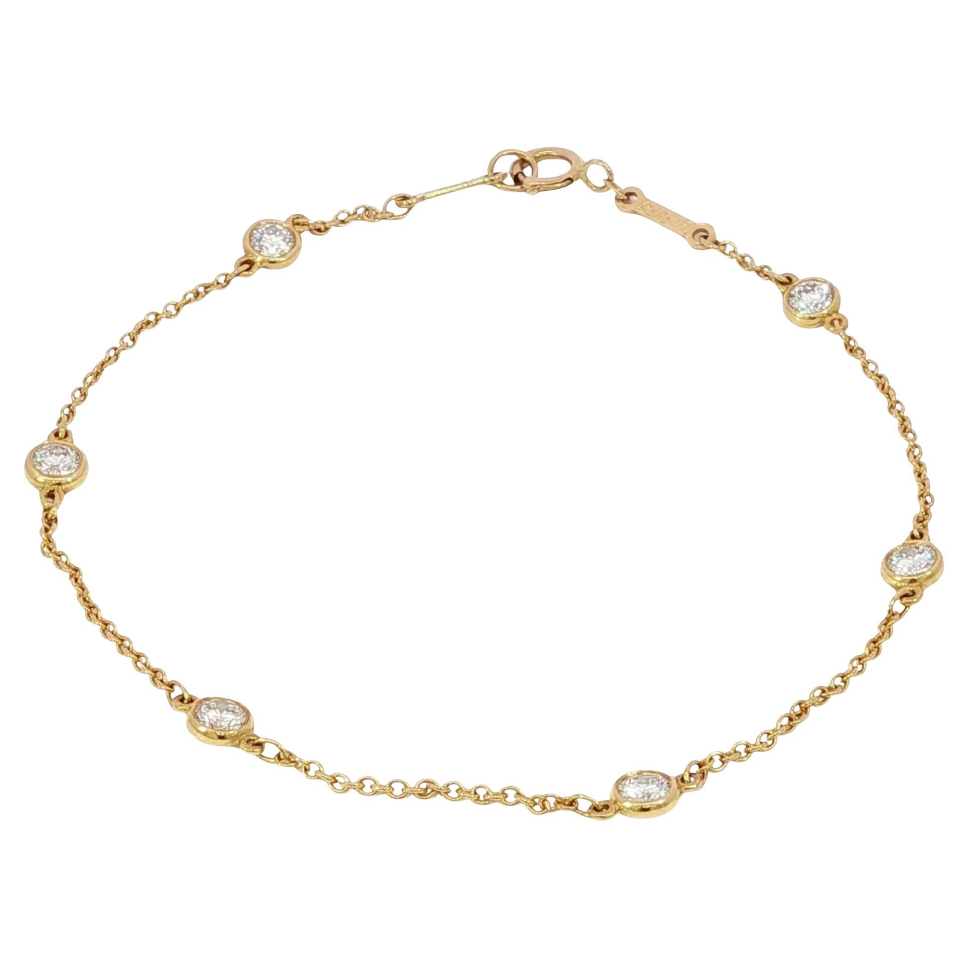 Tiffany 
Co. Elsa Peretti Pulsera de oro amarillo con diamantes 18 quilates