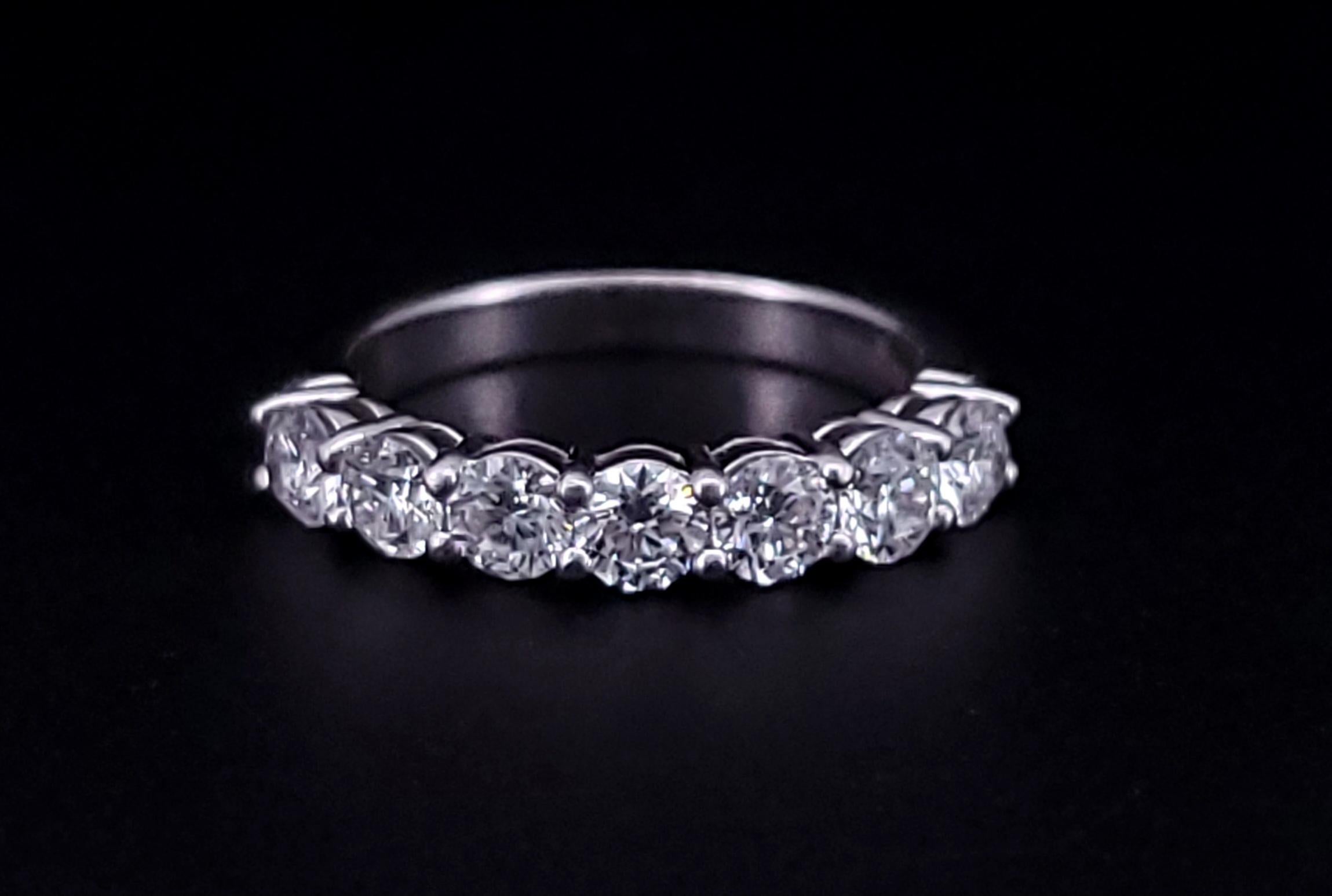 Brand Tiffany & Co. 
Wedding Anniversary band
Style: Half-circle Band
Metal: Platinum PT950 
Size: 7 sizable 
Measurements: (front) 3.5 MM X  (back) 2.4mm
Diamond TCW: 1.05 
Diamond: 7 Round Brilliant 
Diamonds. Color Grade F-G 
Diamonds Clarity VS