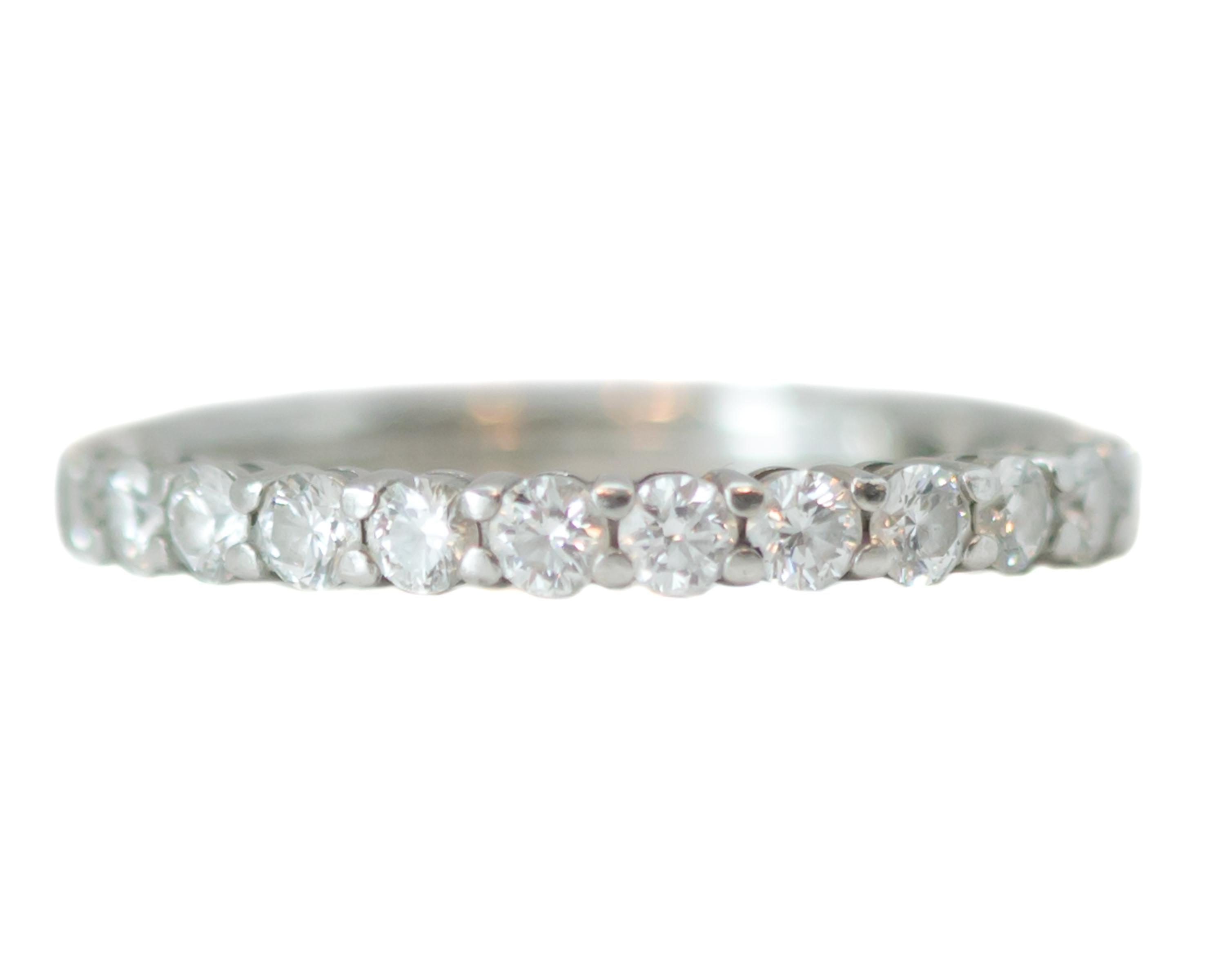 Tiffany and Co. Embrace Band Ring - Platinum, Diamonds

Features:
2.2 millimeter Band
0.78 carat total weight Round Brilliant Diamonds
Full circle of diamonds
Platinum setting
Ring fits a size 4 

Ring Details:
Size: 4
Width: 2.2 millimeters
Metal: