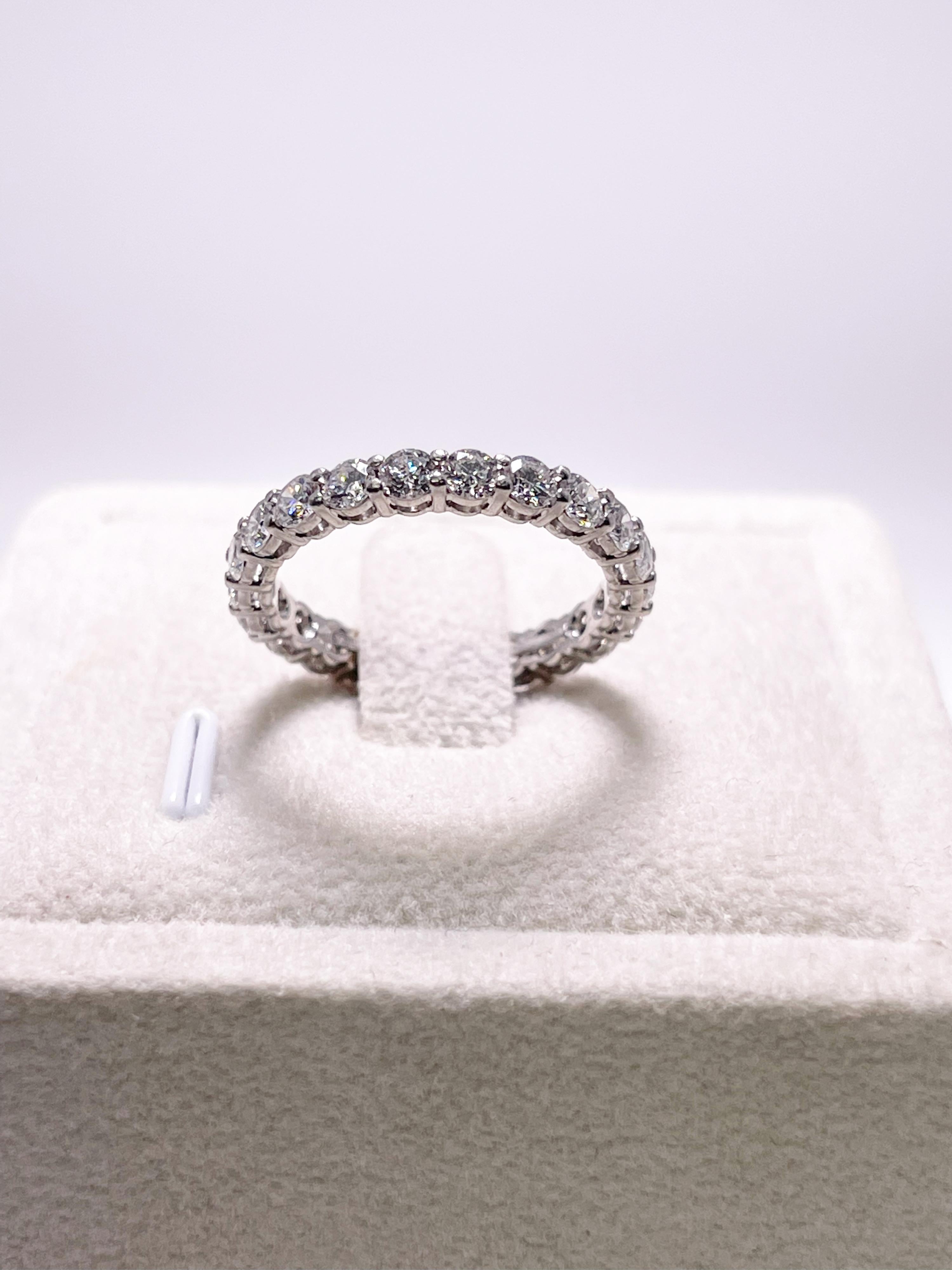 Charming eternity ring by Tiffany & Co. 
This magnificent Tiffany Embrace is made in platinum with VVS diamonds.
Comes with original dust bag and box.
GRAM WEIGHT: 3.34gr
METAL: platinum

NATURAL DIAMOND(S)
Cut: Round Brilliant
Color: E-F 
Clarity: