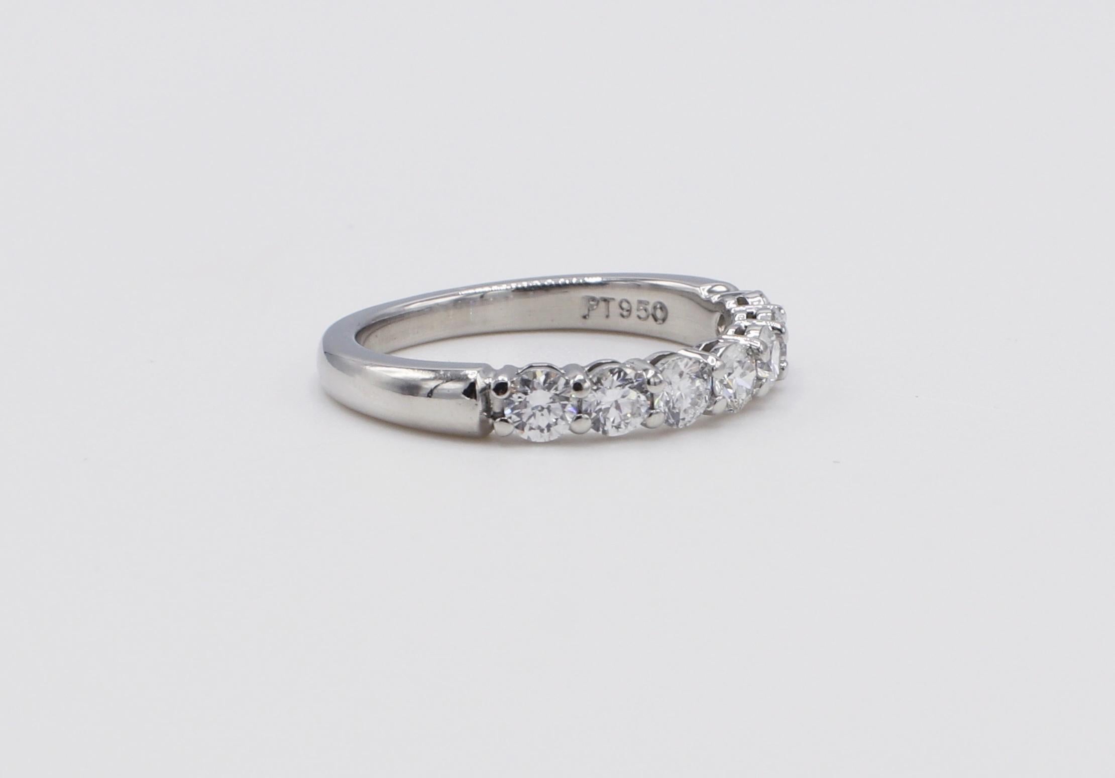Tiffany & Co. Embrace Platinum Natural Diamond 7 Stone .57 Carat Wedding Band Ring Size 4.5
Metal: Platinum
Weight: 3.87 grams
Diamonds: 7 round brilliant cut natural diamonds, approx. .57 CTW F VS
Size: 4.5 (US)
Retail: $5,400 USD