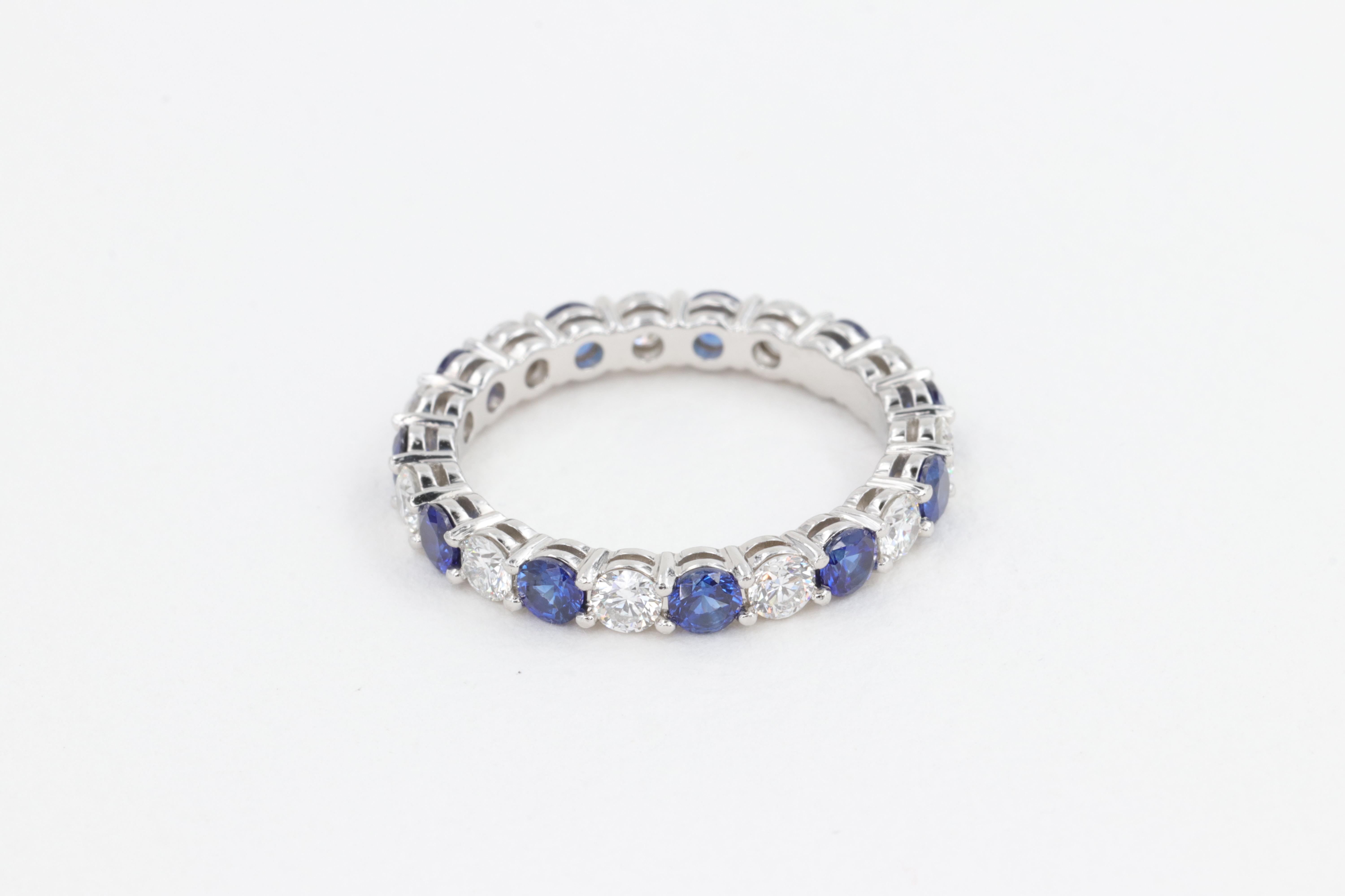 Round Cut Tiffany & Co. Embrace Sapphire and Diamond Eternity Band Ring Set in Platinum  For Sale