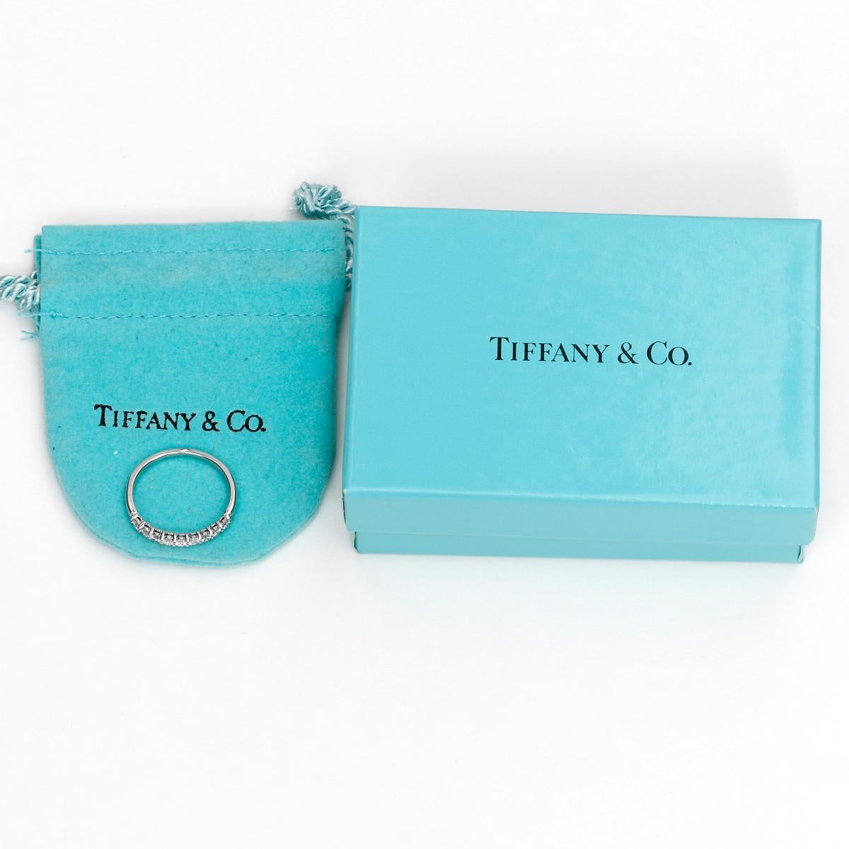 Tiffany & Co. Embrace Wedding Band Size 6  - Tiffany & co 950 Platnium .27 cts. Diamond embrace band. Hallmarks include 950 & makers signature. Total weight 2.5 grams.