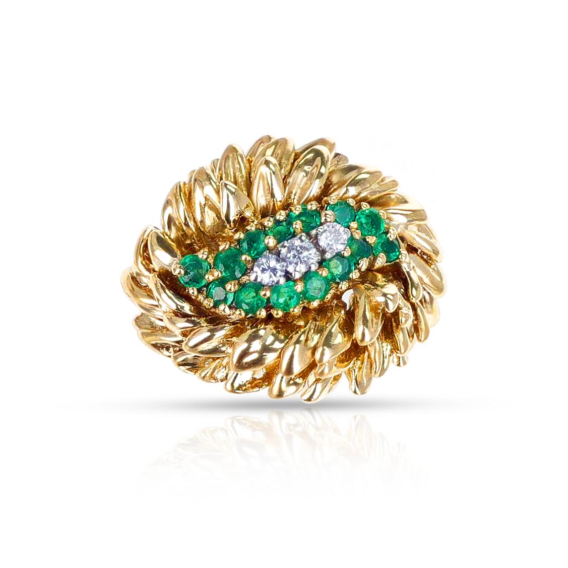 A Tiffany & Co. Emerald and Diamond Gold Cocktail Ring made with round-cut diamonds and emeralds. The ring size is 6.25 US. 
