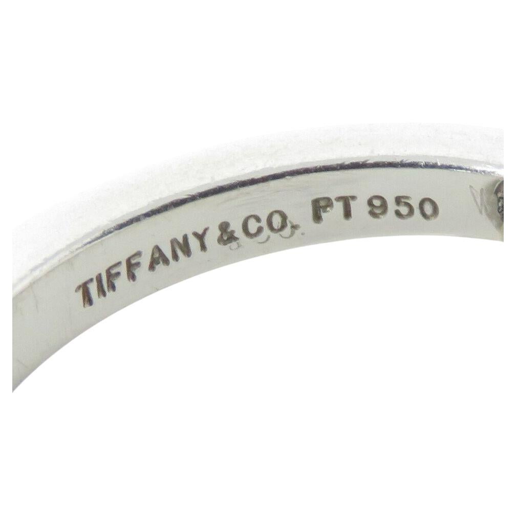  Tiffany & Co.  1.03ct TW, most about F-G and VS range. Center diamond 6.3 x 4.4 x 3.0mm, approx 0.73ct

Marked: Tiffany & Co PT 950

Ring size 4.5 (Sizable)

Total Weight with Setting: 5.3 grams
