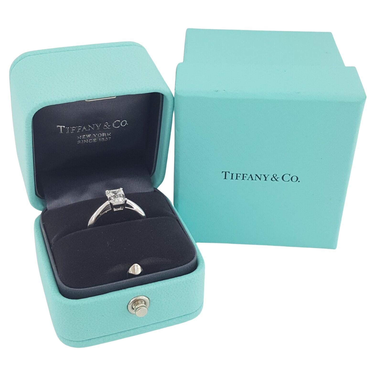 An exquisite Tiffany&Co. Emerald cut diamond solitaire ring set in solid platinum
with blue box and package and GIA certificate

