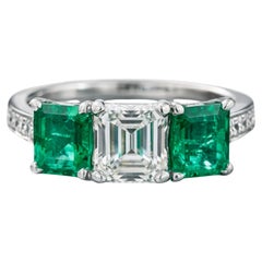 Tiffany & Co. Emerald Cut Emerald and Diamond Platinum Three Stone Ring