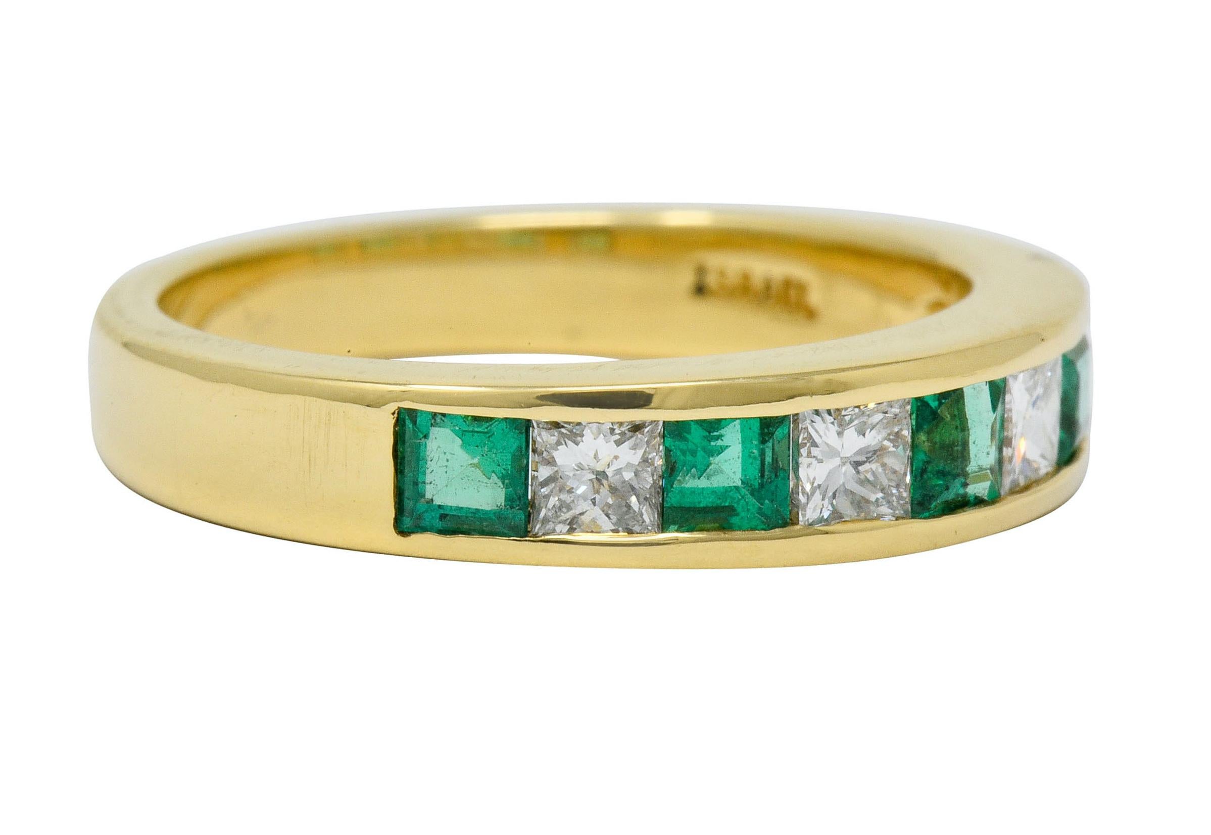 Band ring channel set to front with alternating square cut emerald and princess cut diamonds
Diamonds weigh approximately 0.50 carat total with F/G color and VS clarity

Emeralds are a very well-matched bright green color and weigh approximately