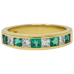 Vintage Tiffany & Co. Emerald Diamond 18 Karat Gold Channel Band Ring, circa 1990