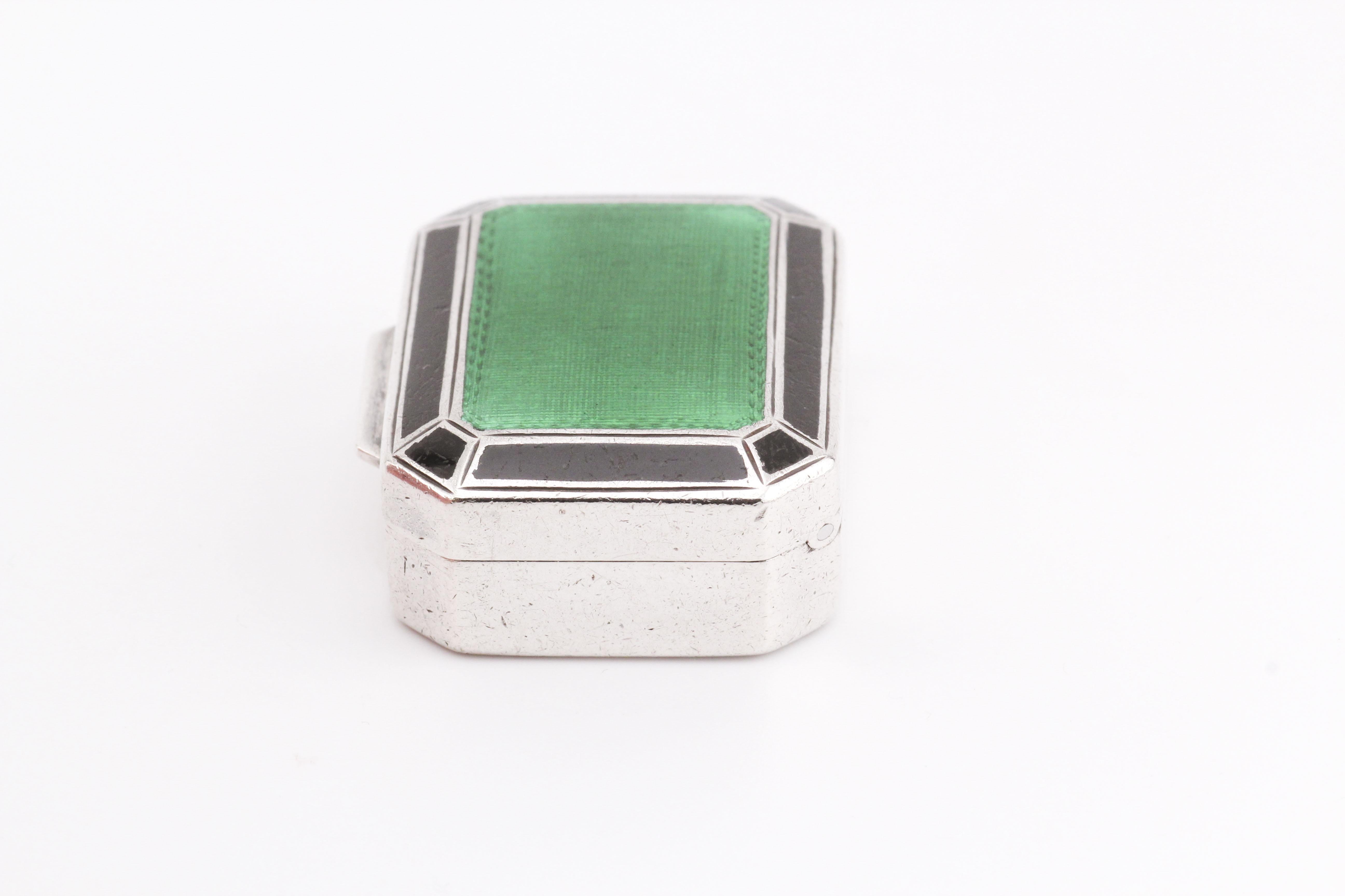 The Tiffany & Co. Enamel 925 Sterling Silver Pill Box Case is a charming yet practical piece that combines Tiffany’s iconic craftsmanship with a touch of playful elegance. Crafted from high-quality 925 sterling silver, this pill box is adorned with