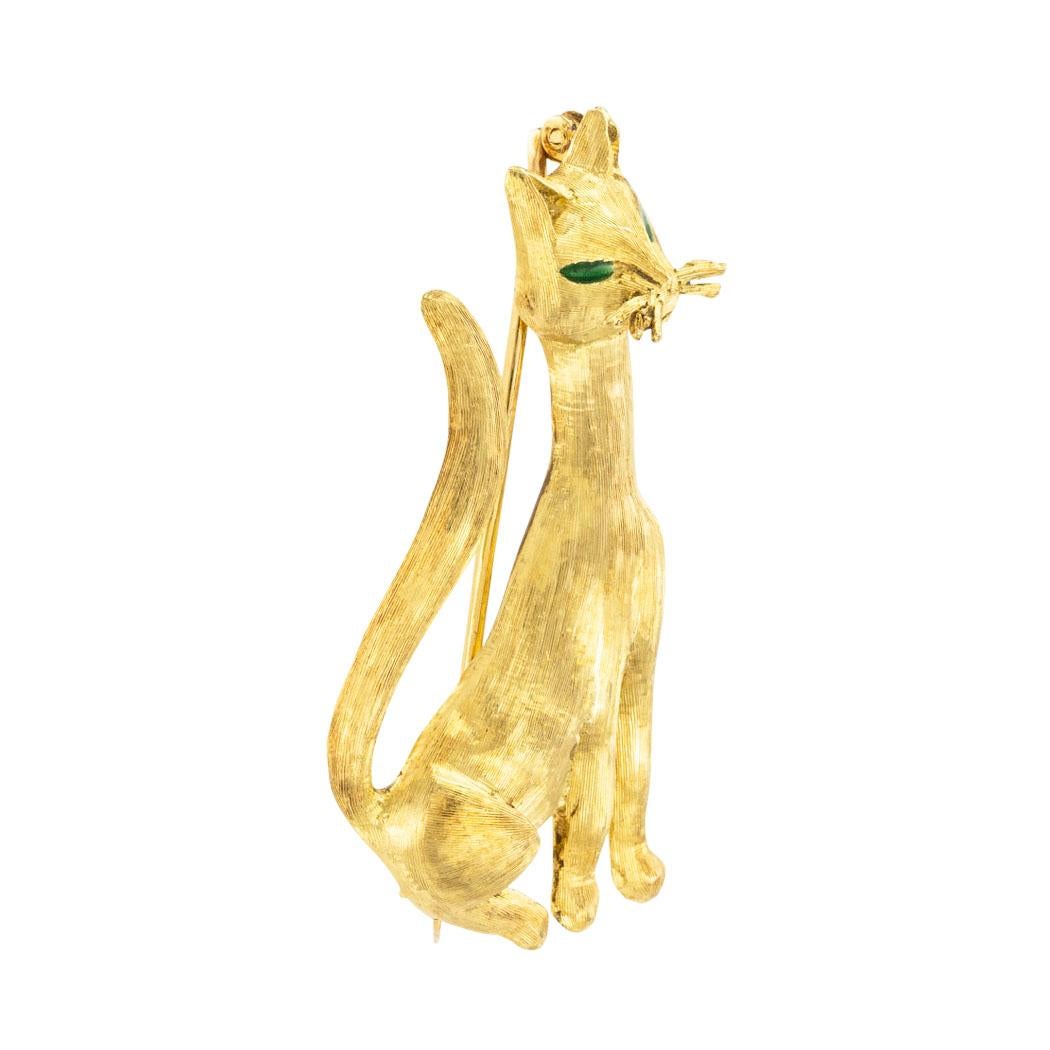 Tiffany & Co green enamel and yellow gold cat brooch circa 1960. *

SPECIFICATIONS:

METAL:  18-karat yellow gold decorated by a Florentine finish.

WEIGHT:  10.2 grams.

HALLMARKS:  signed Tiffany.

ENAMEL:  two green enamel eyes.

MEASUREMENTS: 