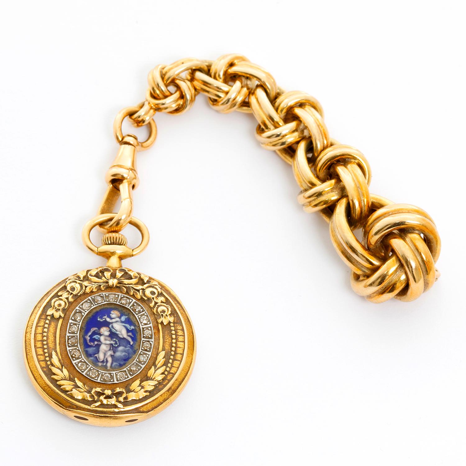 Tiffany & Co. Enameled 14K Yellow Gold Pocket Watch Brooch - Manual winding. 14K yellow gold; reverse pictures an impeccably executed enamel of two angels with diamonds surrounded ( 27.4 mm ). White dial with a double sunk dial with Arabic numerals