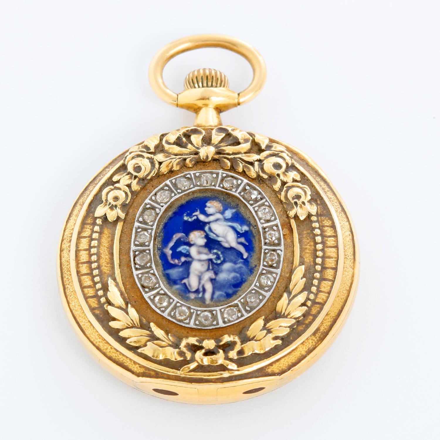 Tiffany & Co. Enameled 18K Yellow Gold Pocket Watch Brooch - Manual winding. 18K yellow gold; reverse pictures an impeccably executed enamel of two angels with diamonds surrounded ( 27.4 mm ). White dial with a double sunk dial with Arabic numerals