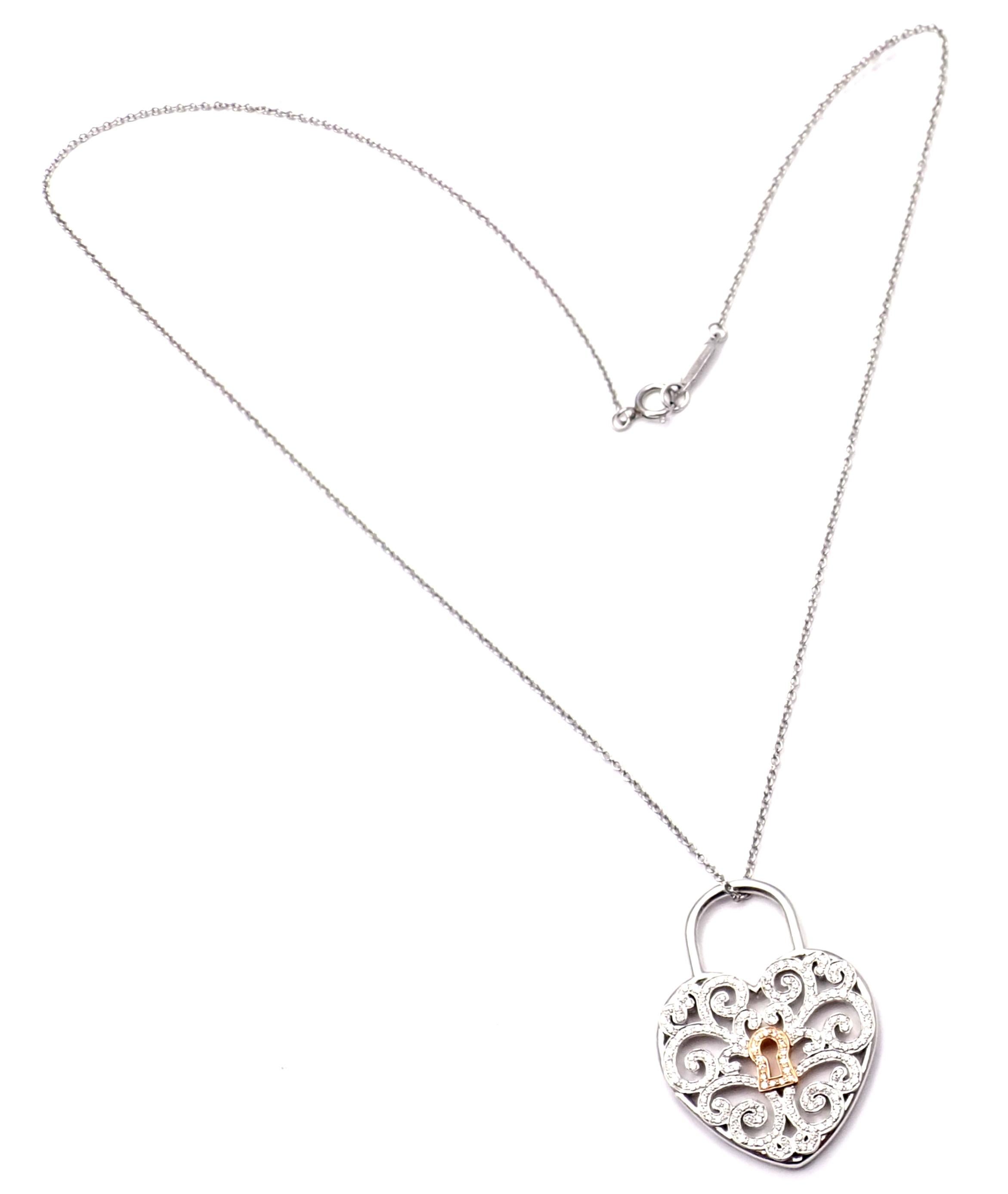 Platinum And 18k Rose Gold Diamond Heart Lock Pendant Necklace by Tiffany & Co.
With Round brilliant cut diamonds VS1 clarity, G color total weight approx. 2.5ct
Details:
Length: 16