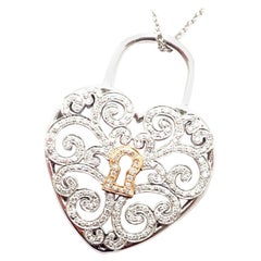 Tiffany & Co. Enchant Diamond Heart Lock Collier pendentif en or jaune et platine avec serti cœur