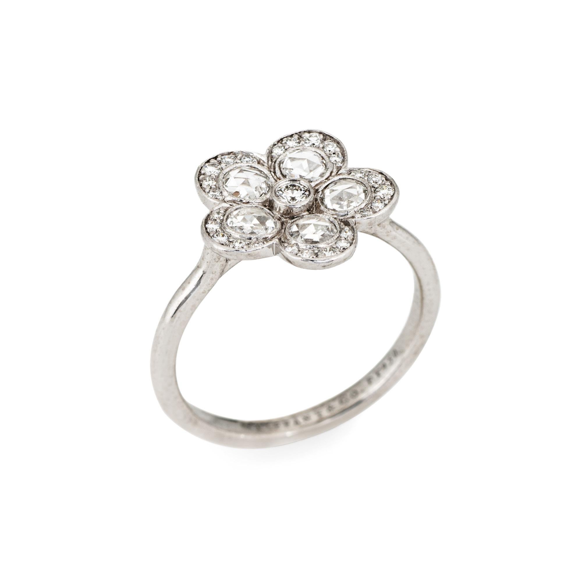 Estate Tiffany & Co diamond flower ring from the 'Enchant' collection, crafted in platinum.  

Rose cut and round brilliant cut diamonds total an estimated 0.70 carats (estimated at F-G color and VVS2 clarity).

From the Tiffany & Co 'Enchant'
