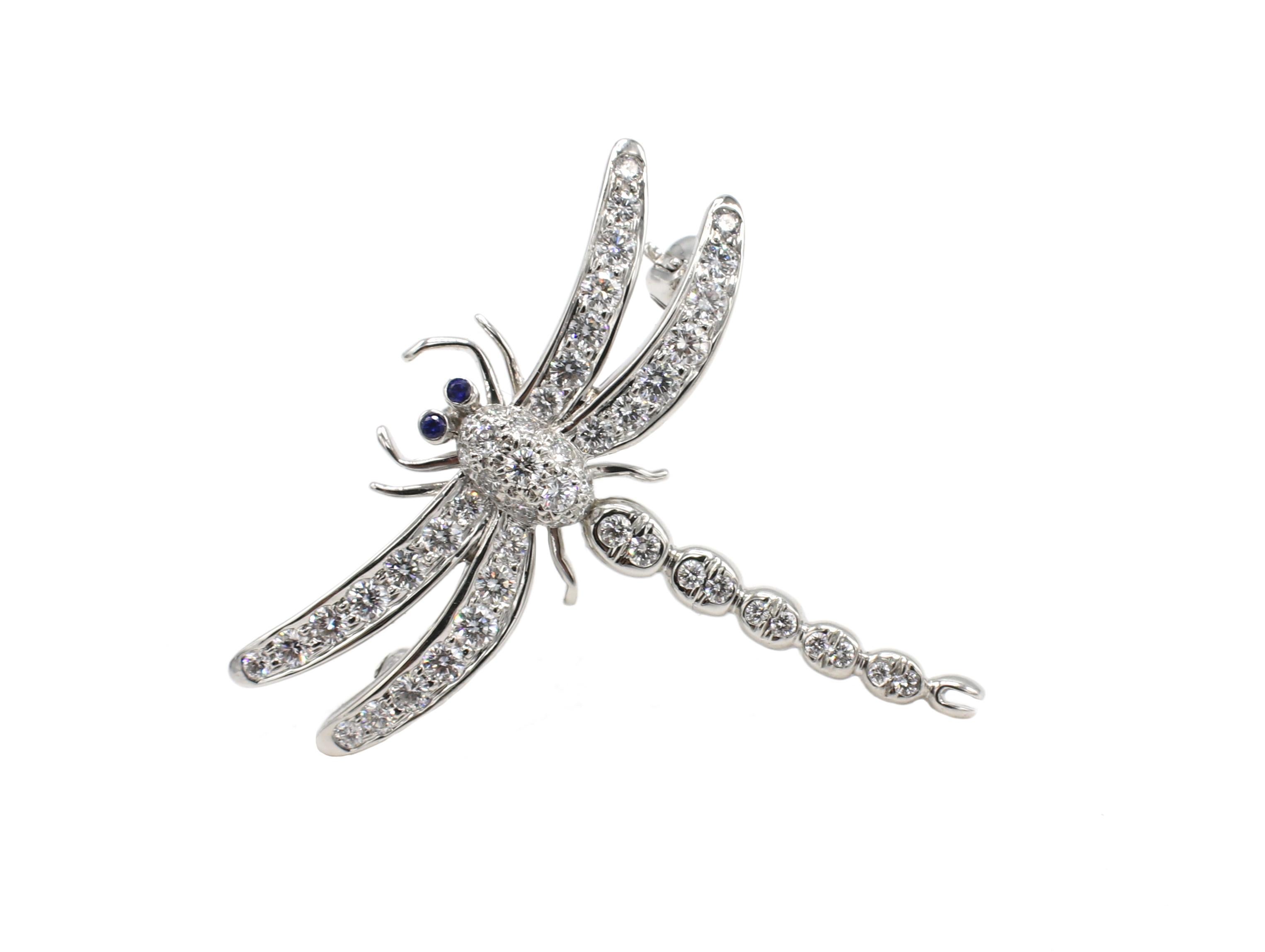 Tiffany & Co. Enchant Platinum Diamond & Sapphire Dragonfly Pin Brooch 
Metal: Platinum
Weight: 5.58 grams
Diamonds: 51 round brilliant cut diamonds, approx. .70 CTW D-F VS 
Sapphires: 2 round blue sapphires approx. .01 CTW 
Length: 29MM
Width: