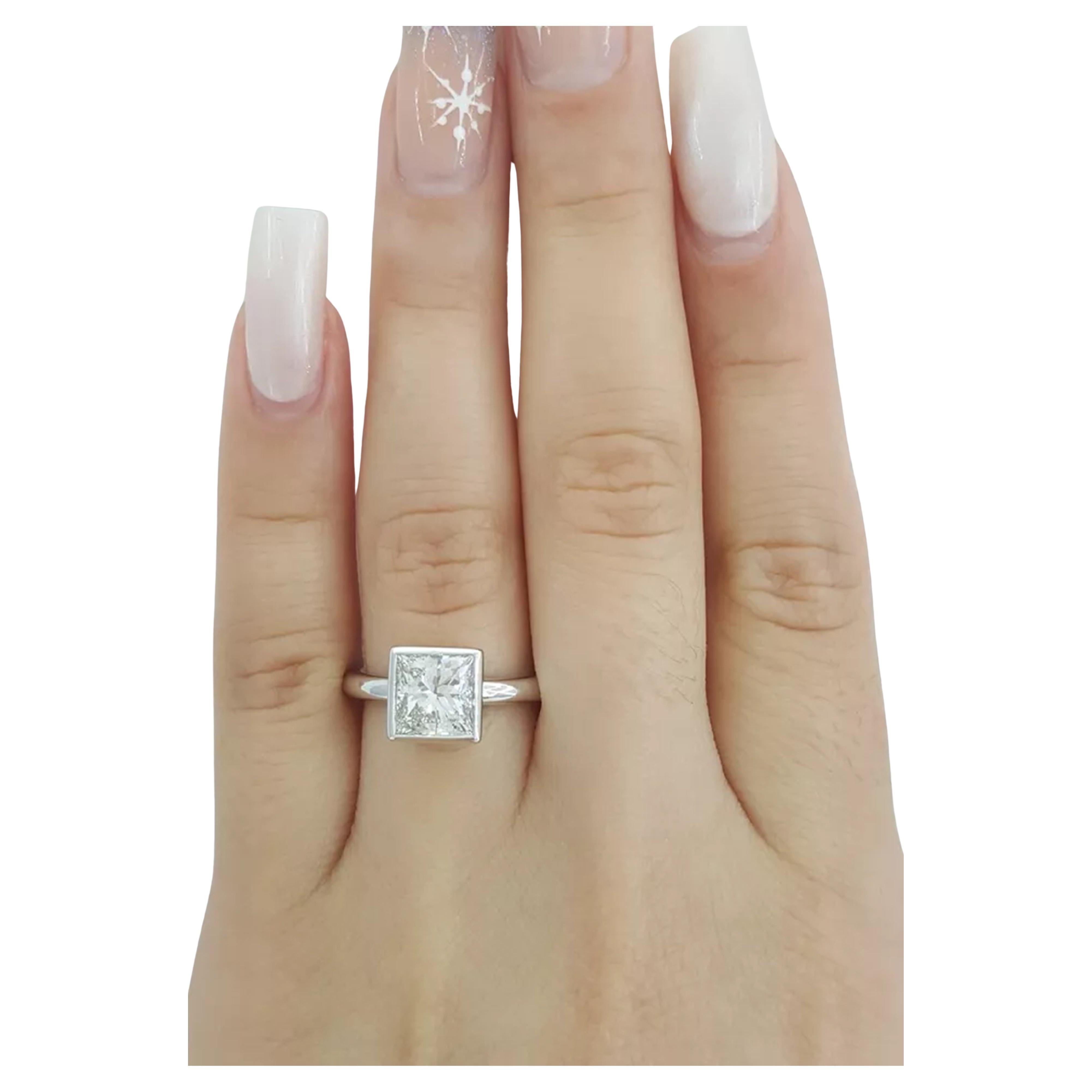 Contemporary TIffany & Co. engagement ring features a 2.01 ct Princess Diamond Ring For Sale