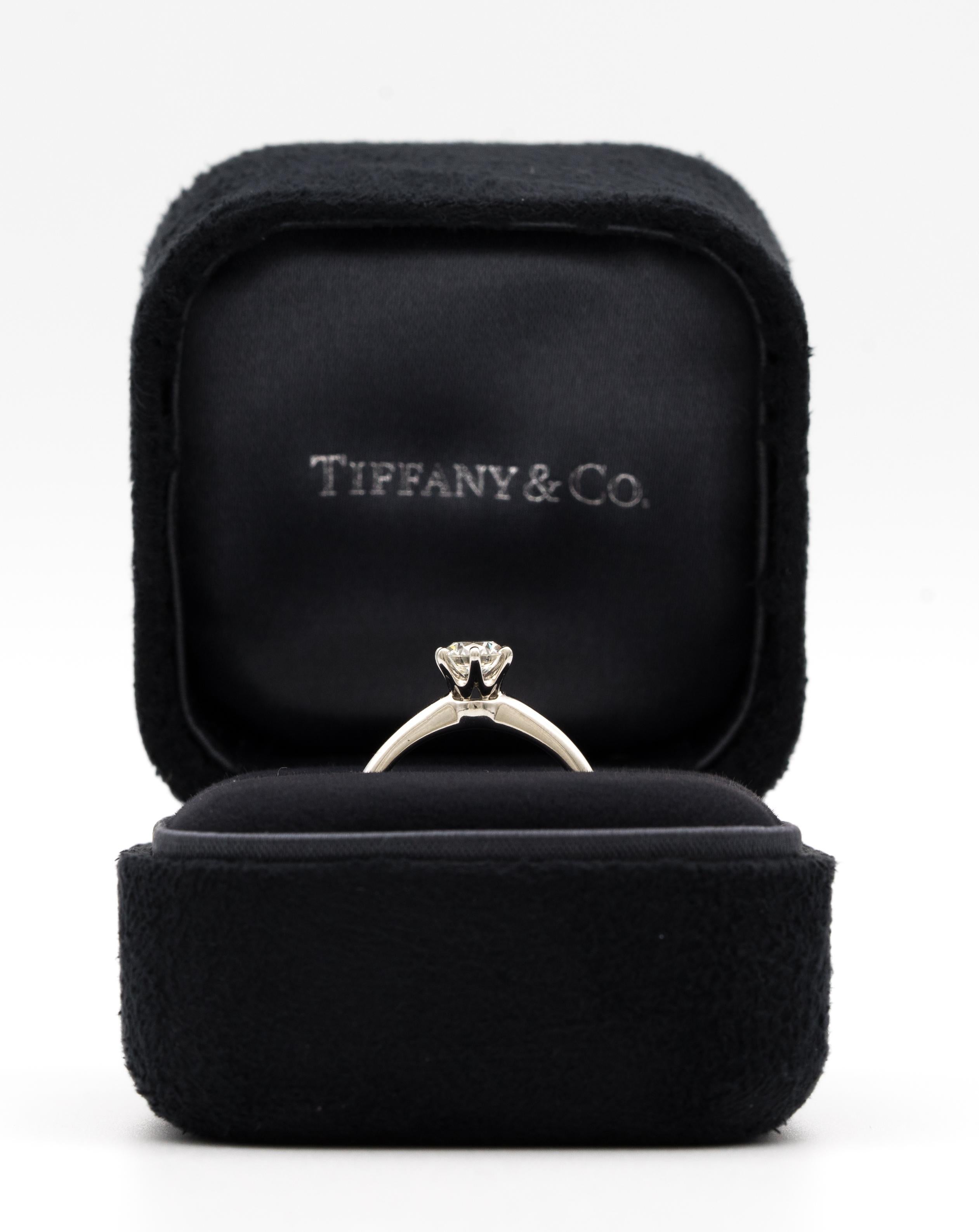 Round Cut Tiffany & Co. Engagement Ring with 1.28 Carat Centre in Platinum ($18, 200)