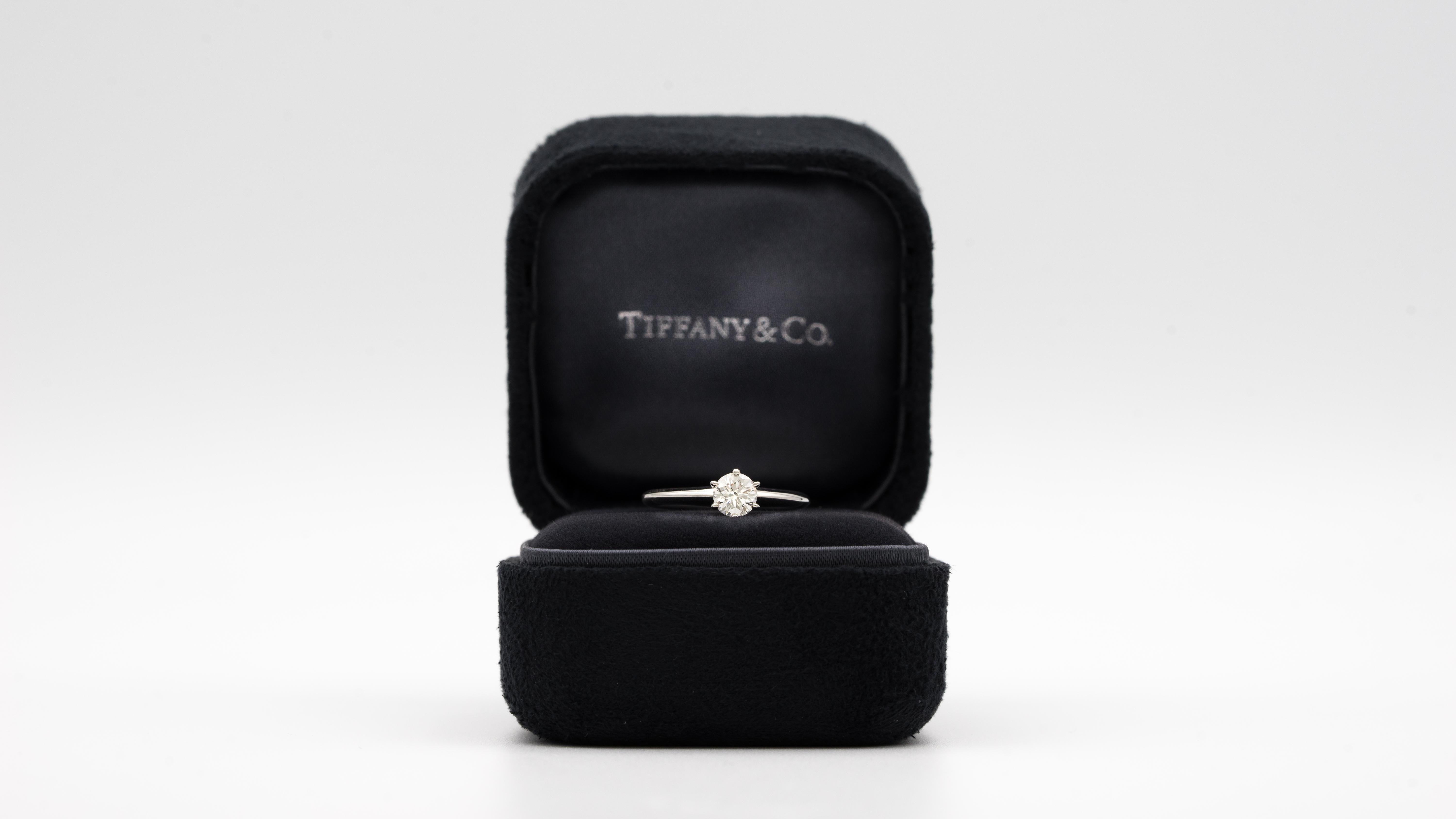 Tiffany & Co. Diamond Engagement Solitaire signed by Tiffany & Co. featuring a 1.28 ct Center, graded by Tiffany I color , and VS1 Clarity.

Brand : Tiffany & CO
Ring type: Solitaire
Center Diamond: 1.28 Carat
Color / Clarity:  I VS1
Metal: