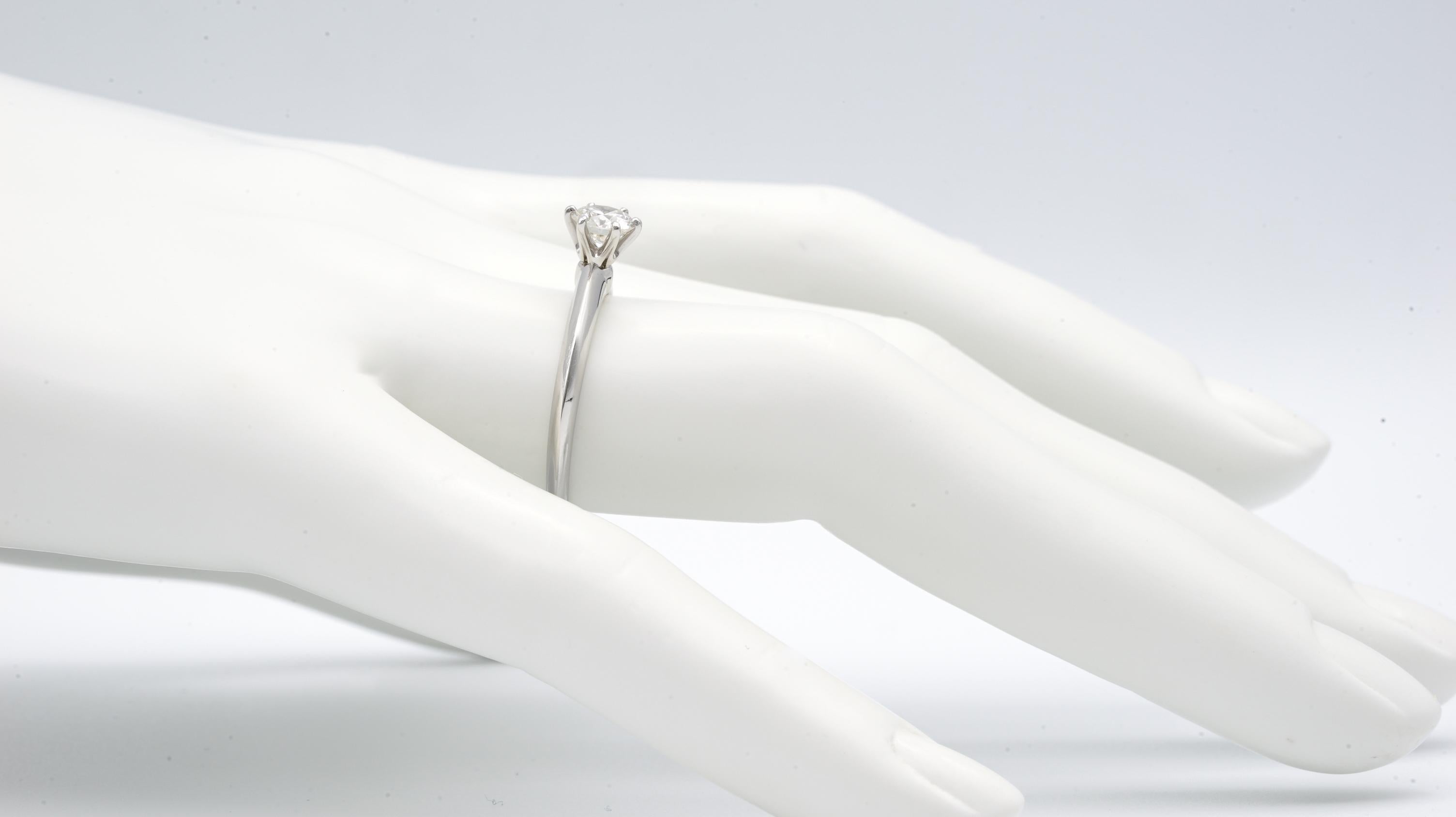 Tiffany & Co. Engagement Ring with .51 Carat Round Brilliant Center in Platinum In Excellent Condition In New York, NY