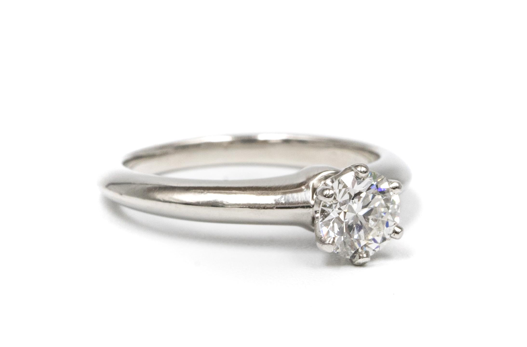 Contemporary Tiffany & Co. Engagement Ring with .66 Carat Round Brilliant Centre in Platinum