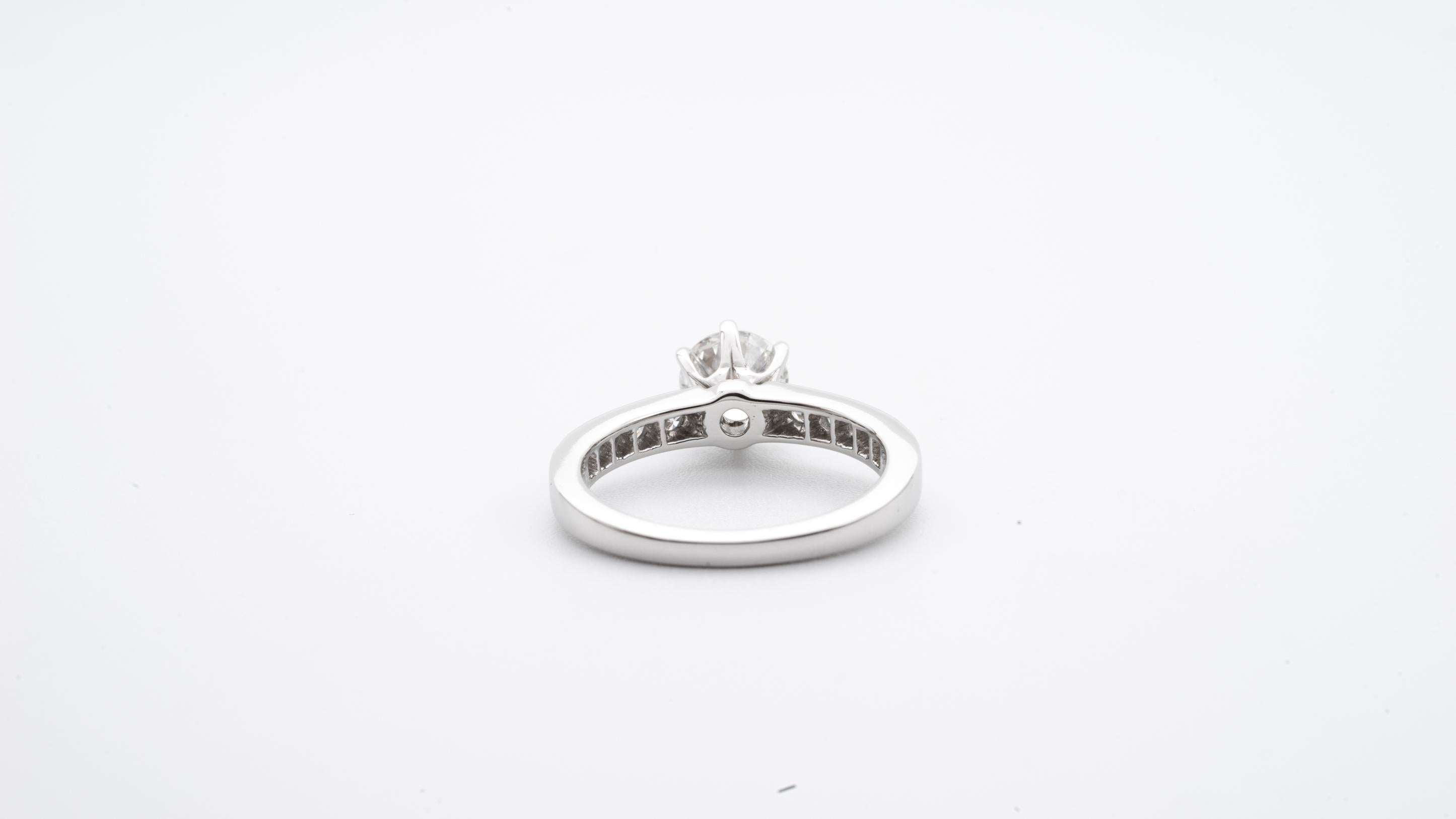 Round Cut Tiffany & Co. Engagement Ring with .85 Carat Round Brilliant Centre in Platinum