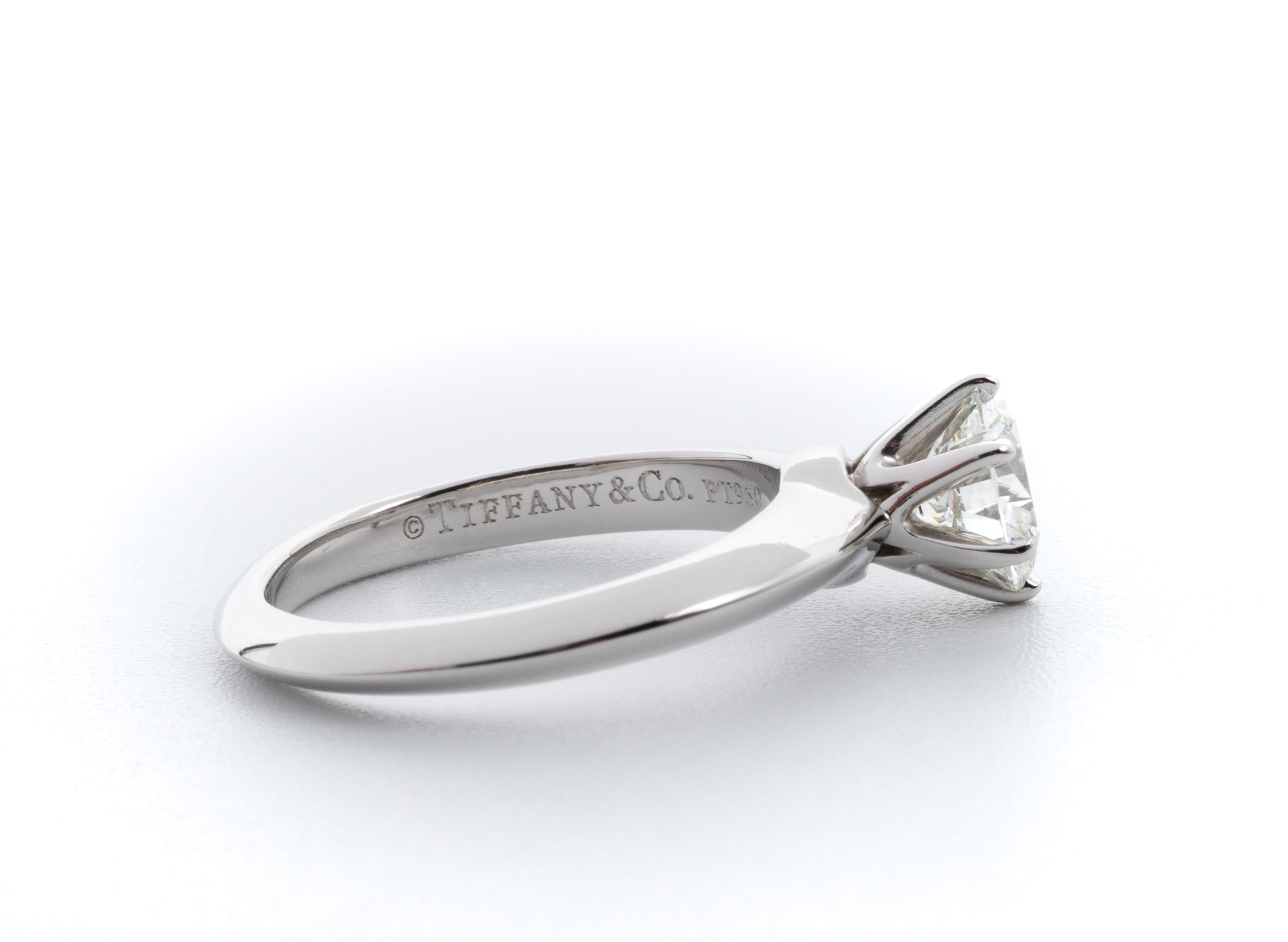 Tiffany & Co. Diamond Engagement Solitaire signed by Tiffany & Co. featuring a .96 ct Center, graded by Tiffany H color , and VS1 Clarity.
In Platinum
Includes GIA certificate , Original Tiffany Certificate and Box and Tiffany appraisal 
Crown