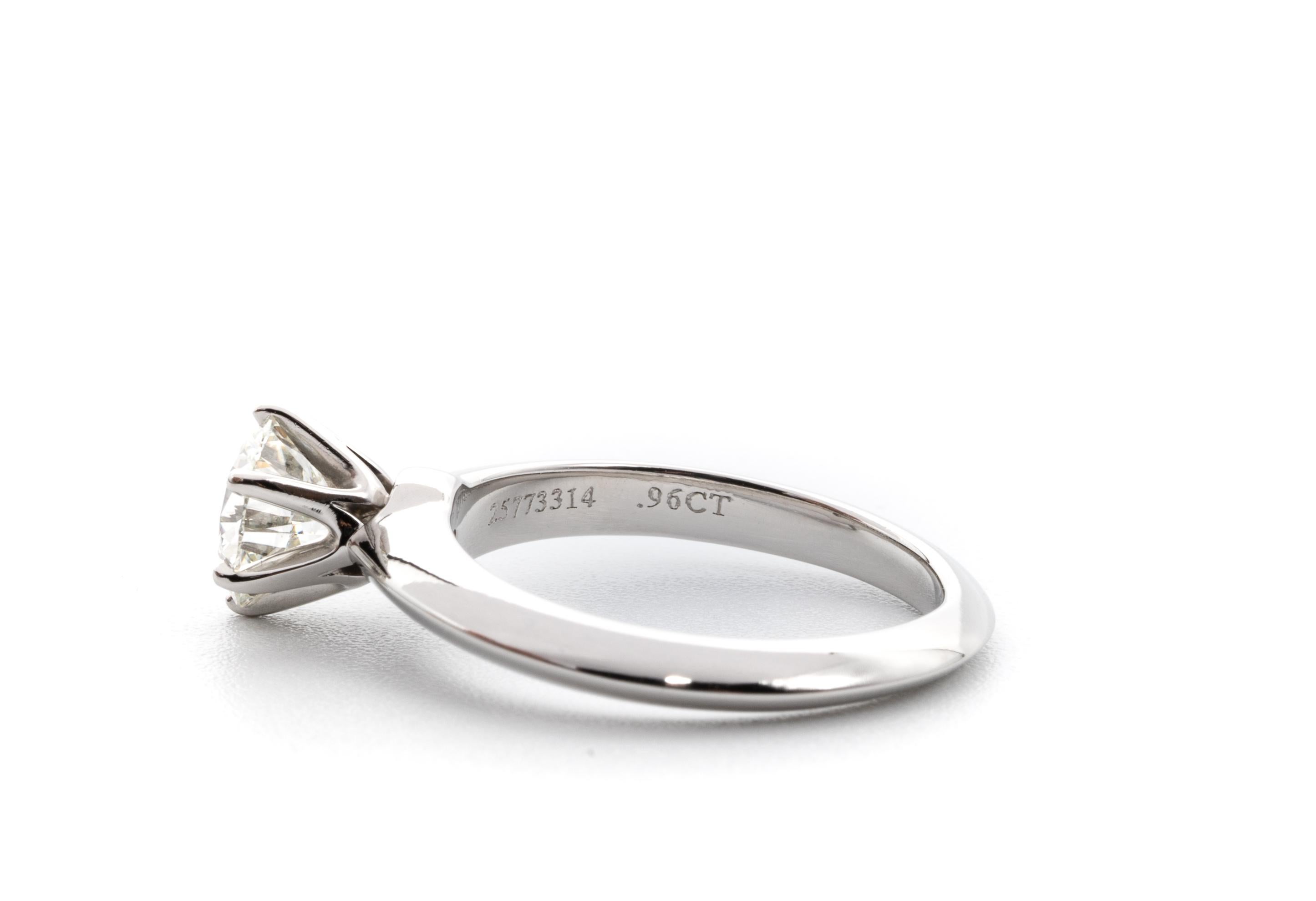 Round Cut Tiffany & Co. Engagement Ring with .96 Carat Round Brilliant Centre in Platinum