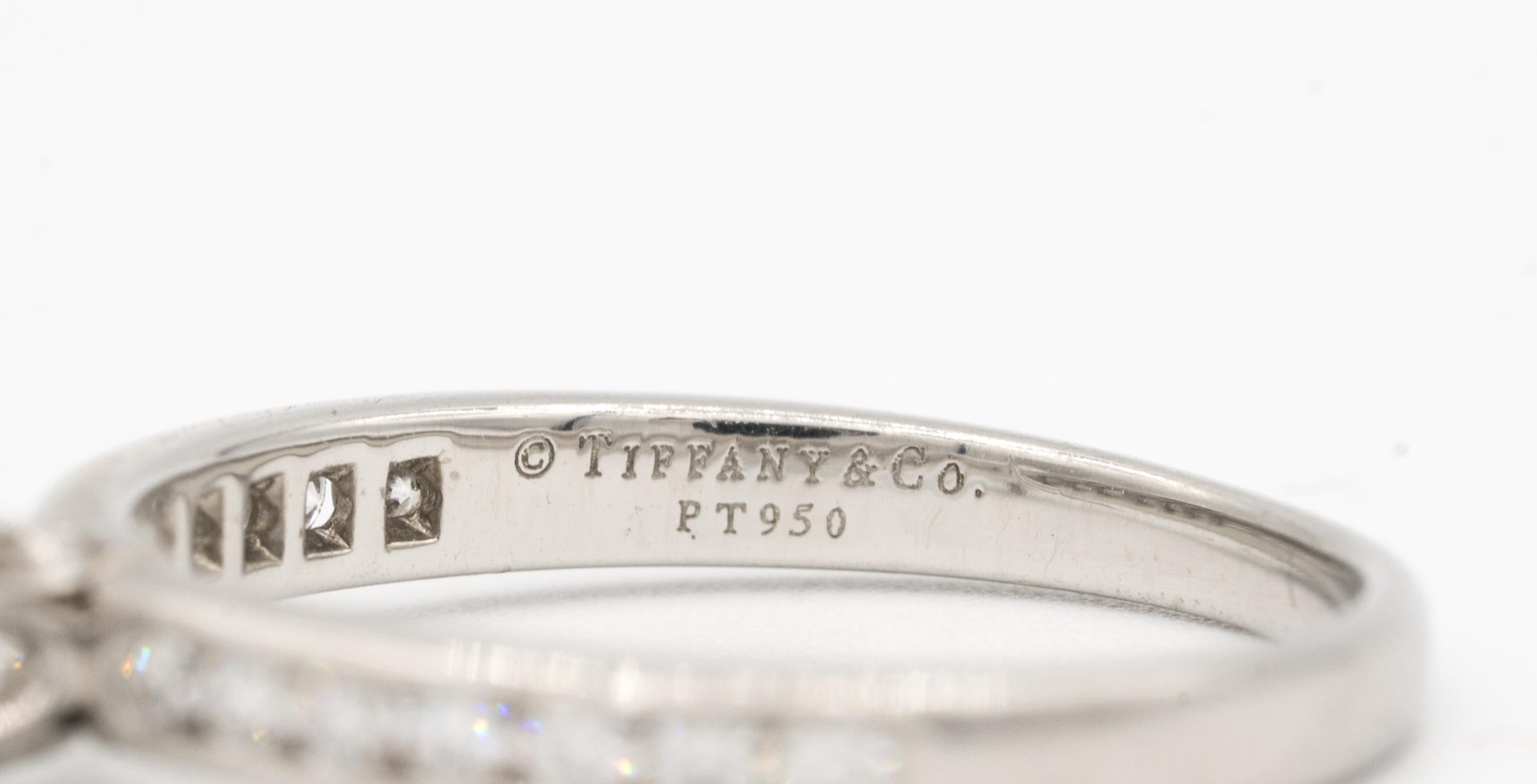 Contemporary Tiffany & Co. Engagement Ring with Channel-Set Diamond Band in Platinum