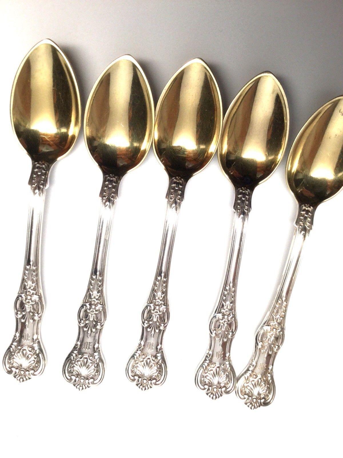 Tiffany & Co. English King Pattern 1885 sterling silver set of 5 demitasse spoons. Presented is a set of 5 sterling silver and gold washed demitasse spoons made by Tiffany & Company. This set is in the English King pattern, which was patented in