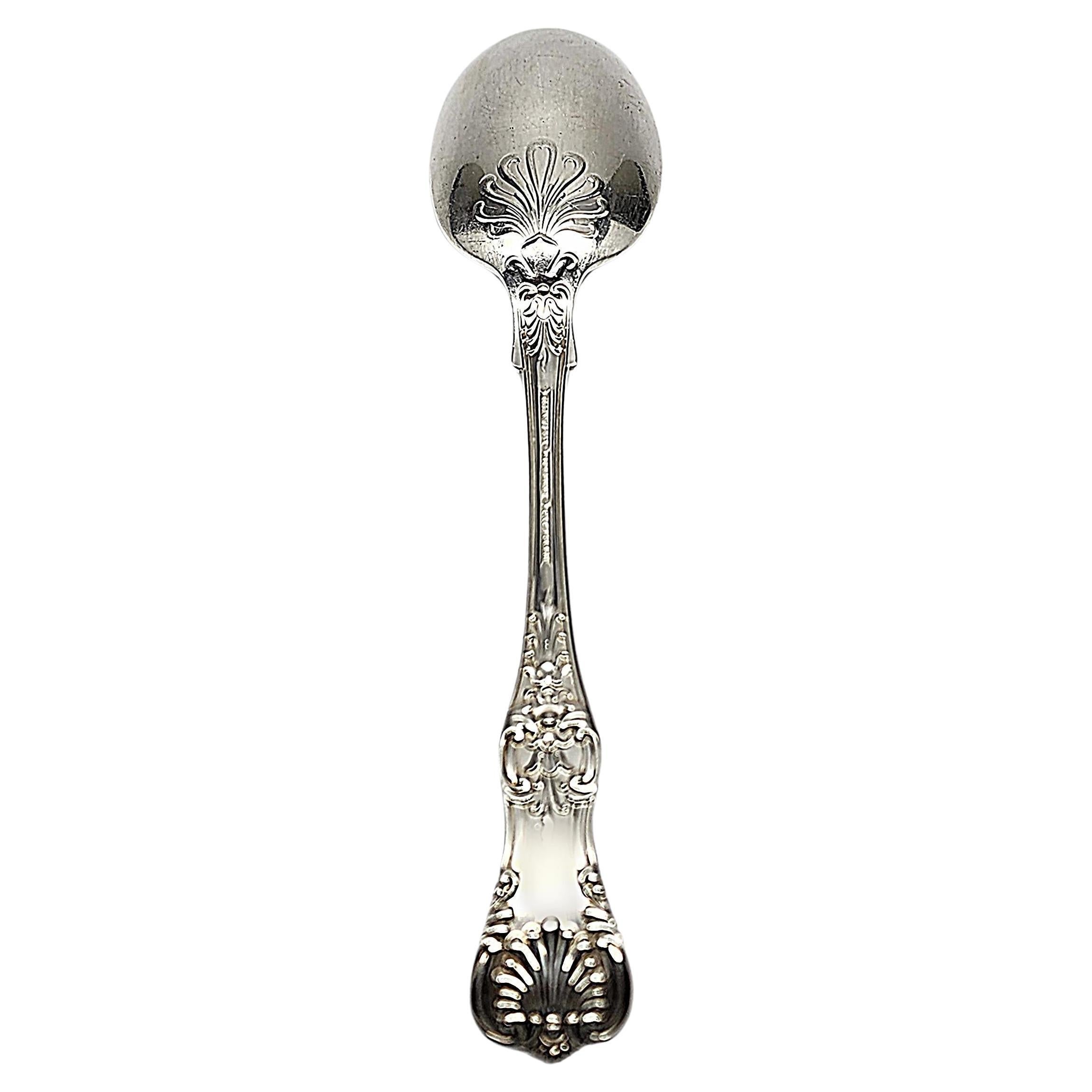 Sterling silver serving tablespoon by Tiffany & Co in the English King pattern.

No monogram.

Beautiful large spoon in Tiffany's intricate and decorative version of a King pattern, which were very popular in the late 19th century. The M mark dates