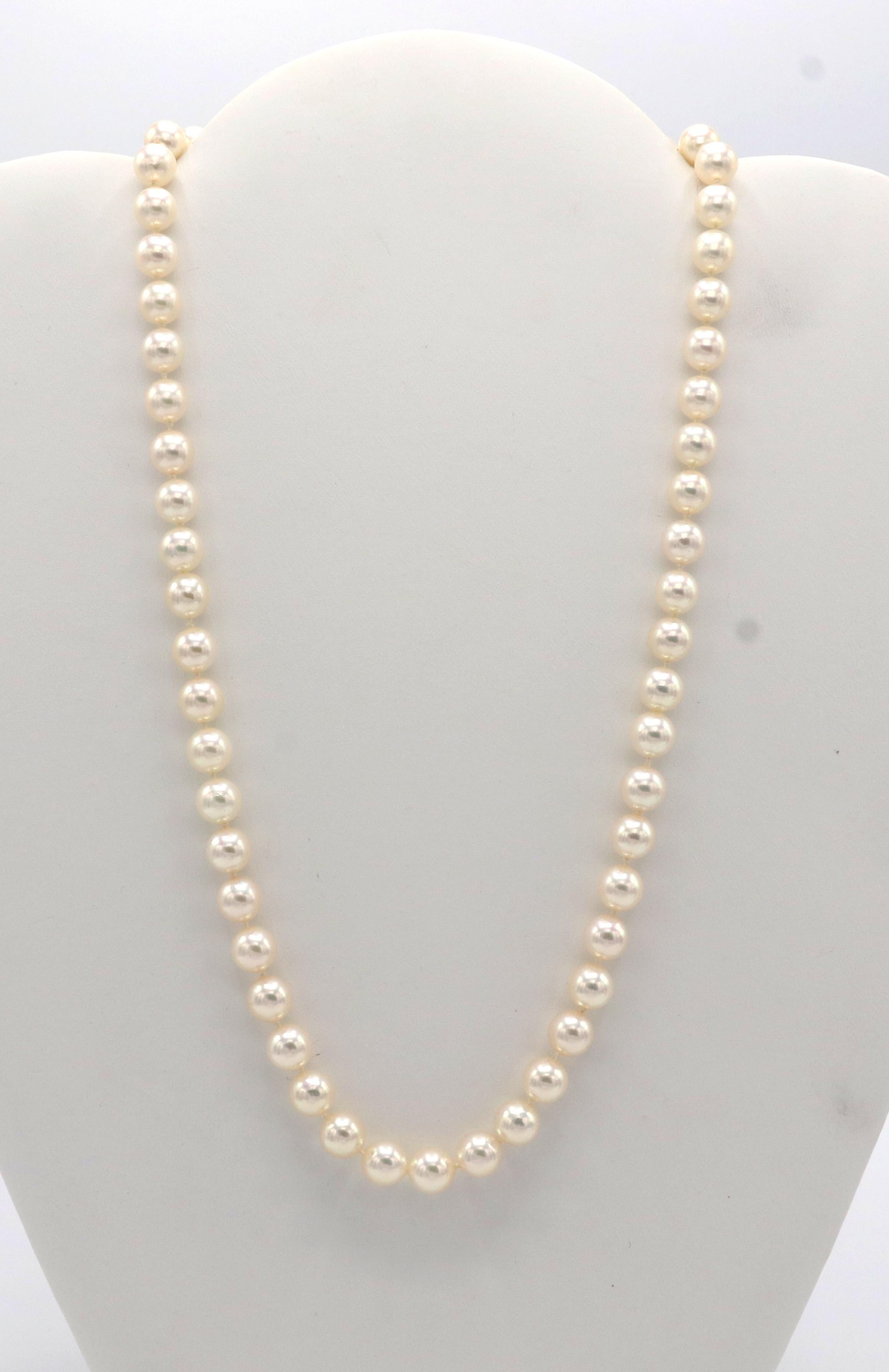 Tiffany & Co. Cultured Pearl 18 Karat White Gold Necklace 
Metal: 18k white gold
Weight: 38.05 grams
Length: 18 inches
Pearls: 7.5mm cultured pearls with a creamy luster
