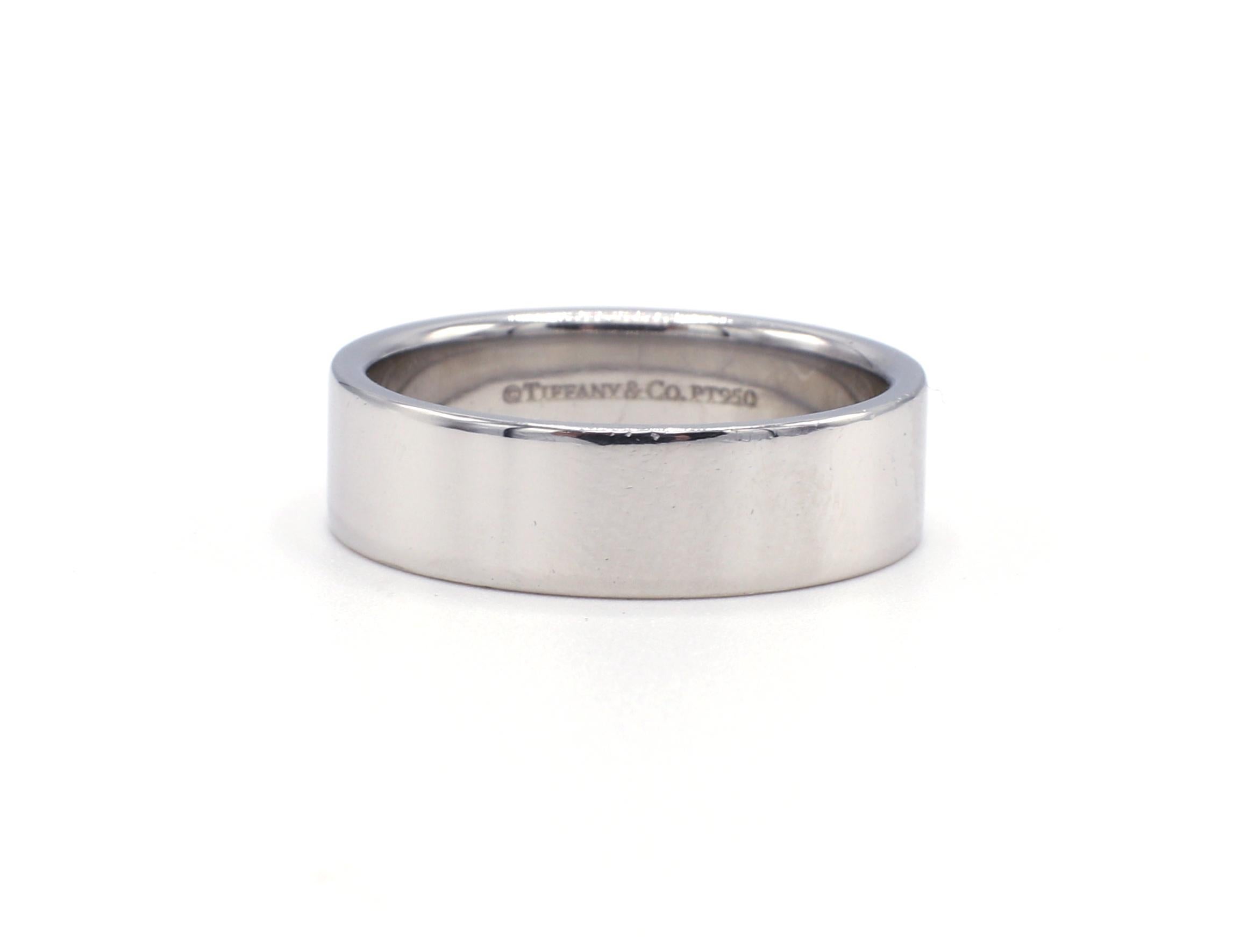 Tiffany & Co. Essential Platinum 6mm Wedding Band Ring

Metal: Platinum
Weight: 11.7 grams
Width: 6mm
Signed: Tiffany & Co. PT950
Retail: $2,550 USD