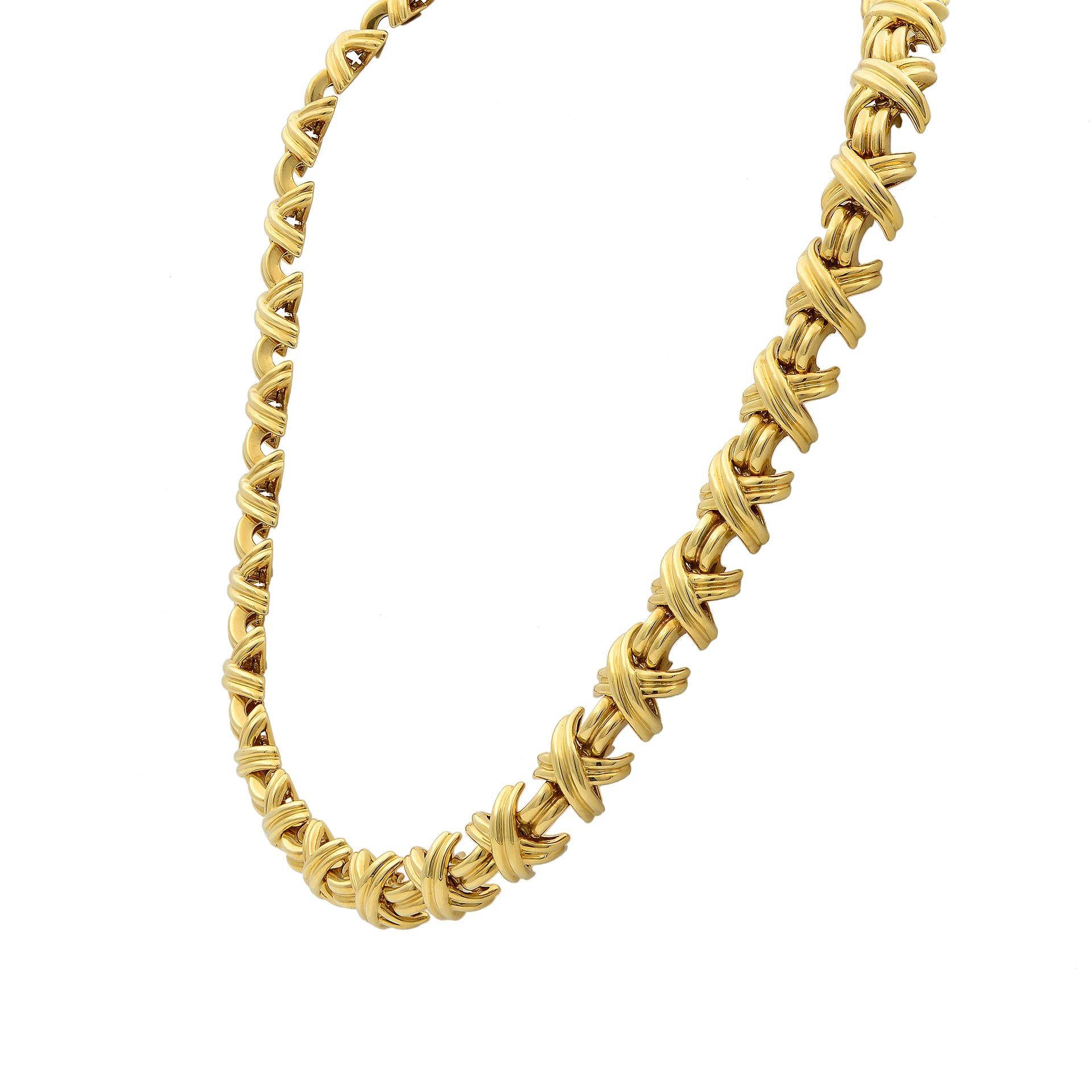 This gorgeous Vintage estate necklace is a signed piece by Tiffany & Co. Its made of vibrant 18k yellow gold, the necklace is part of the iconic Signature 