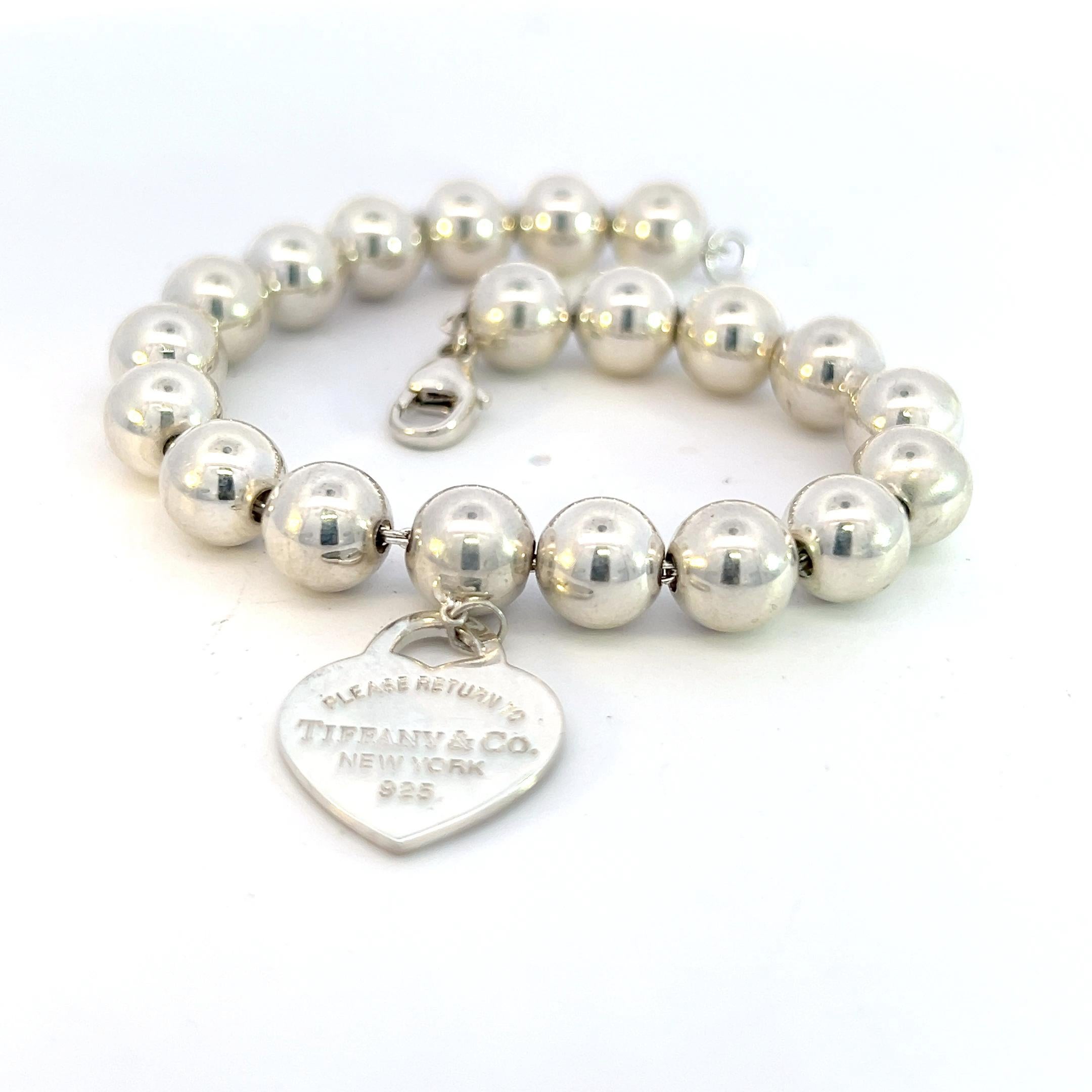 Tiffany & Co Estate Ball Bracelet with Heart Charm Sterling Silver 8 mm In Good Condition In Brooklyn, NY