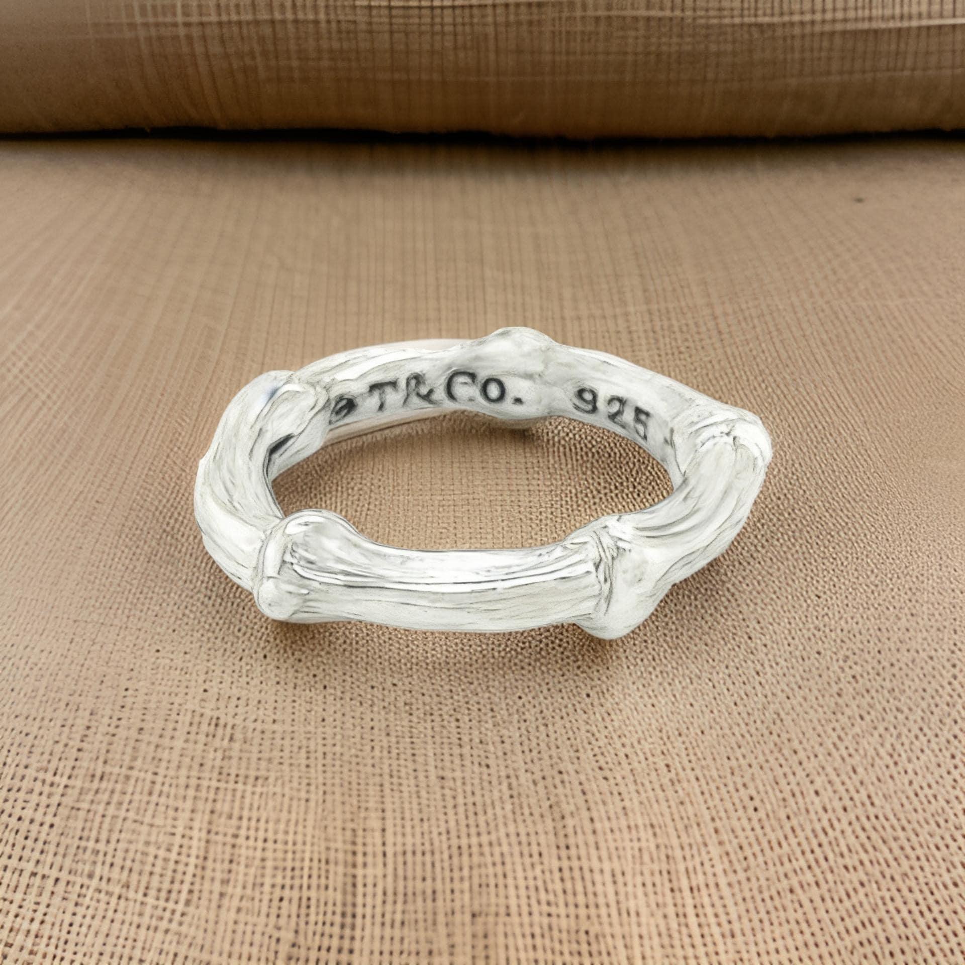 Authentic Tiffany & Co Estate Bamboo Ring Size 5 Sterling Silver 4.6 Grams TIF860

TRUSTED SELLER SINCE 2002

PLEASE SEE OUR HUNDREDS OF POSITIVE FEEDBACKS FROM OUR CLIENTS!!

FREE SHIPPING

DETAILS
Style: Bamboo
Size: 5
Metal: Sterling