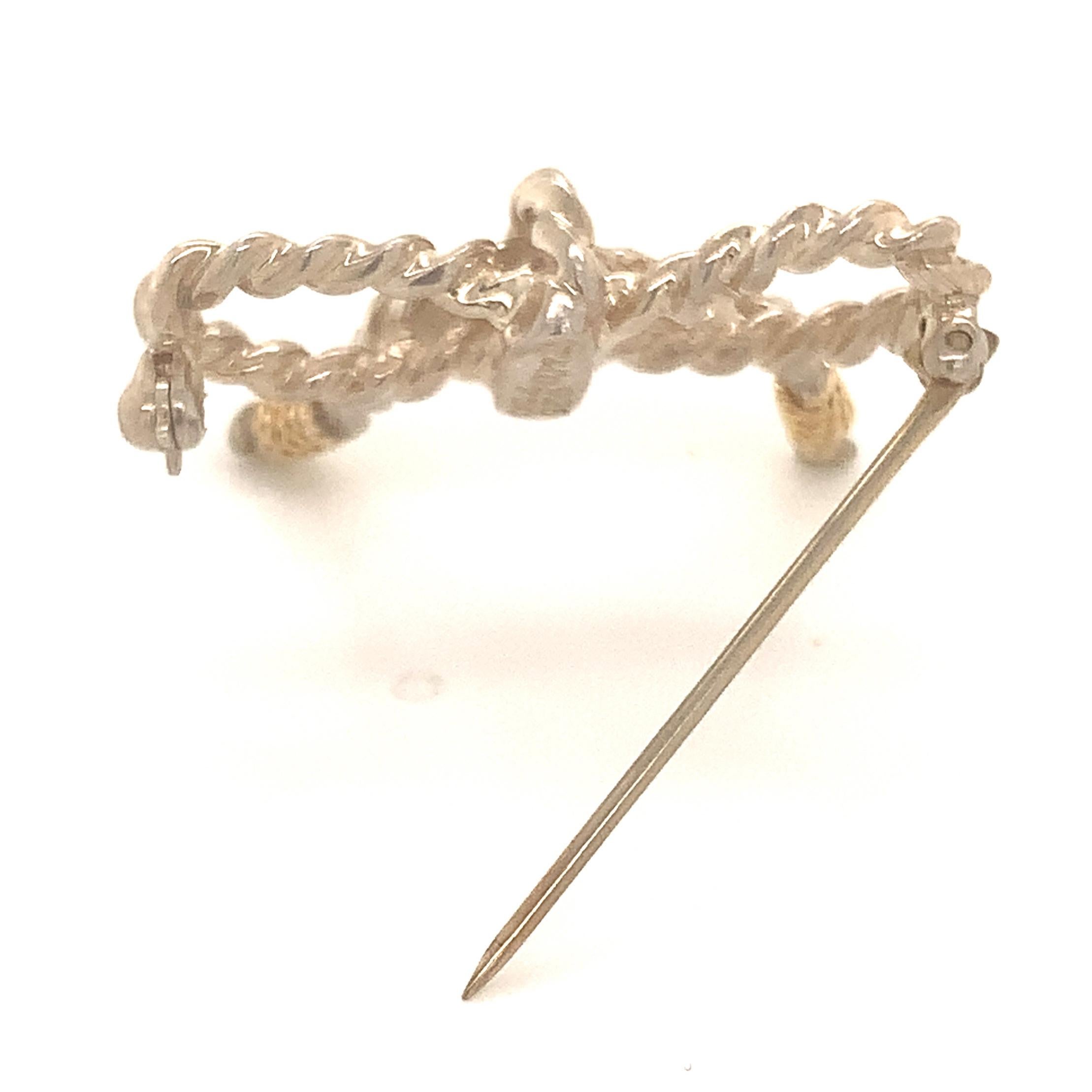 Tiffany & Co Broche en forme de nœud papillon en or 18 carats et argent sterling en vente 2