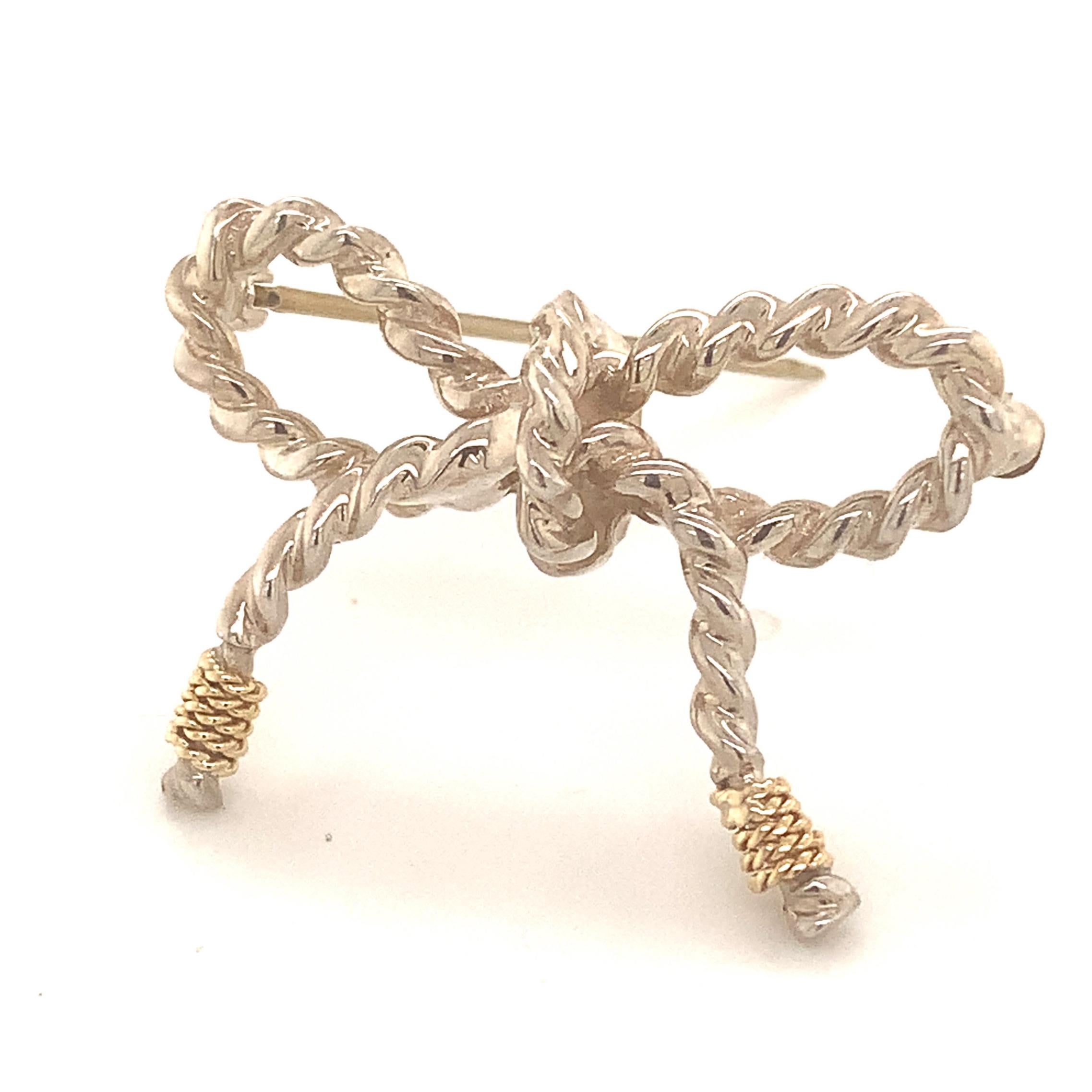 Tiffany & Co Broche en forme de nœud papillon en or 18 carats et argent sterling en vente 3