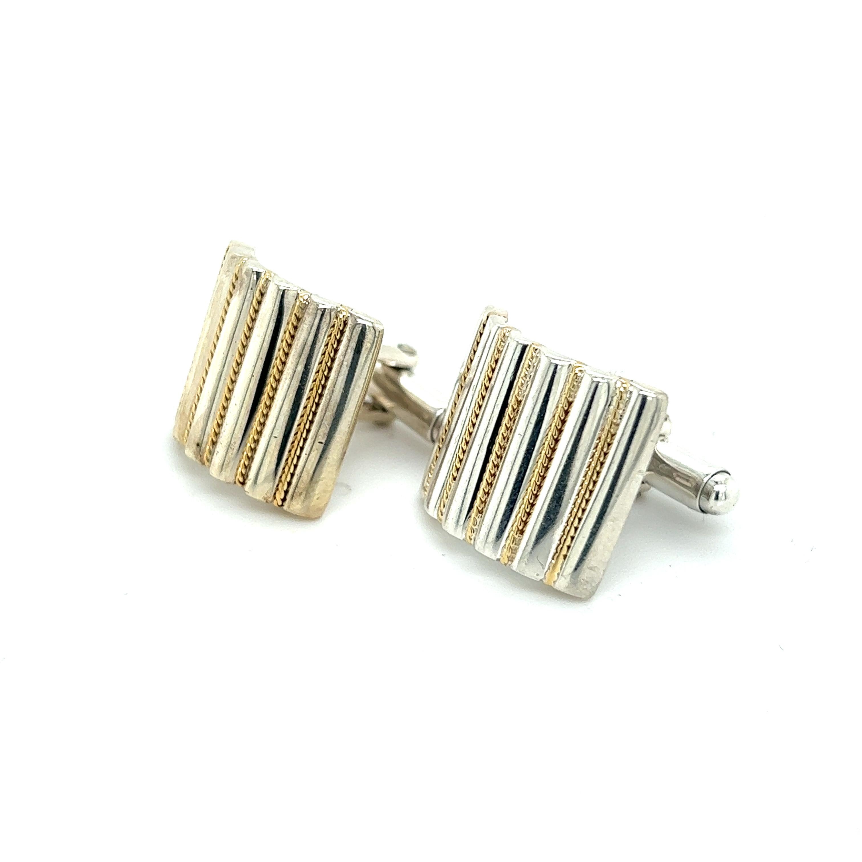 Authentic Tiffany & Co Estate Cufflinks 18k YG + Sterling Silver TIF370

These elegant Authentic Tiffany & Co Men's Cufflinks are made of sterling silver and gold have a weight of 12.52 grams.

TRUSTED SELLER SINCE 2002

PLEASE SEE OUR HUNDREDS OF