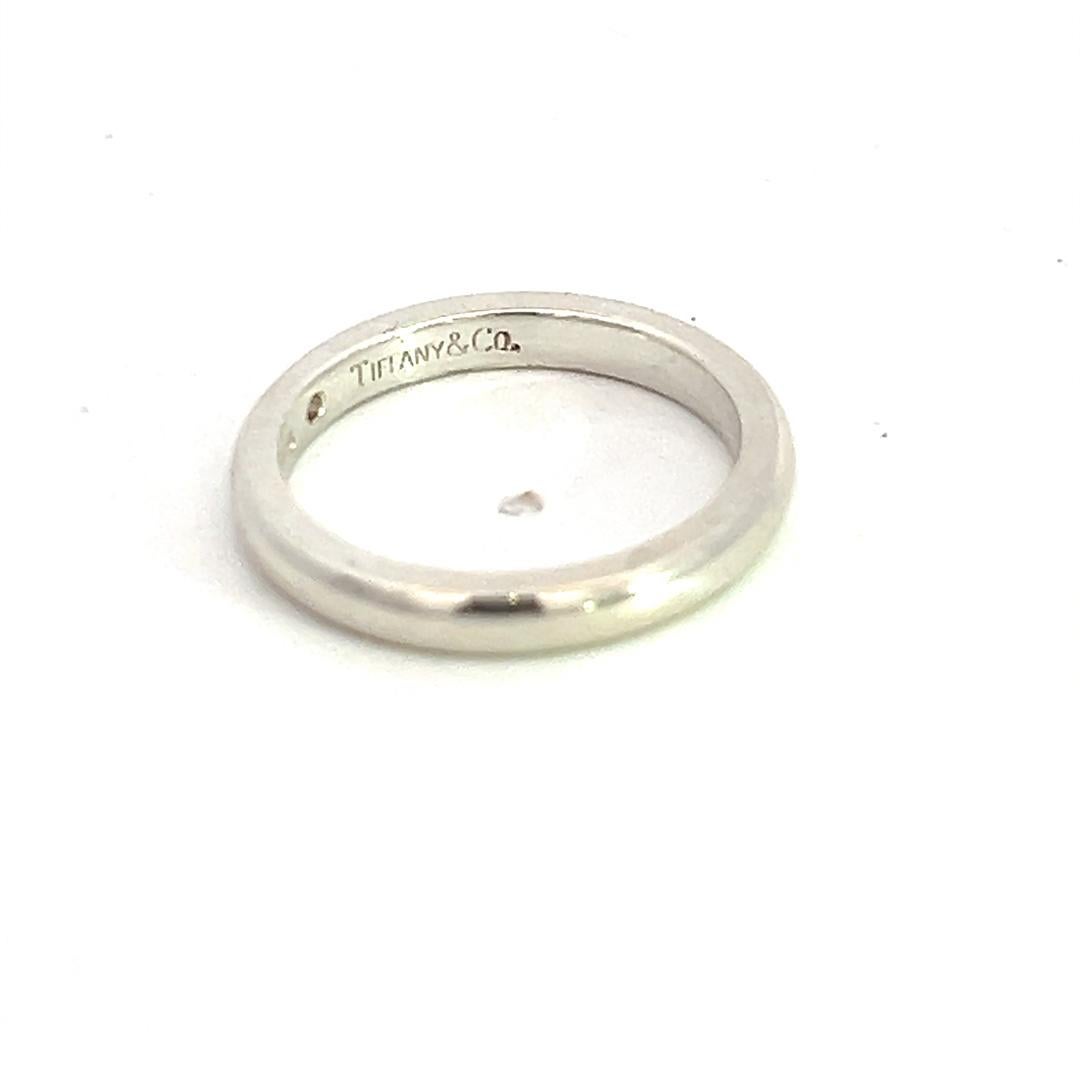 Authentic Tiffany & Co Estate Diamond Ring 4.5 Sterling Silver 2.5 mm By Peretti TIF663

TRUSTED SELLER SINCE 2002

DETAILS
Stone: Diamond
Type: Ring
Ring Size: 4.5
Weight: 2.7 Grams
Height: 2.5 mm
Metal: Sterling Silver
Designer: Peretti

We try to