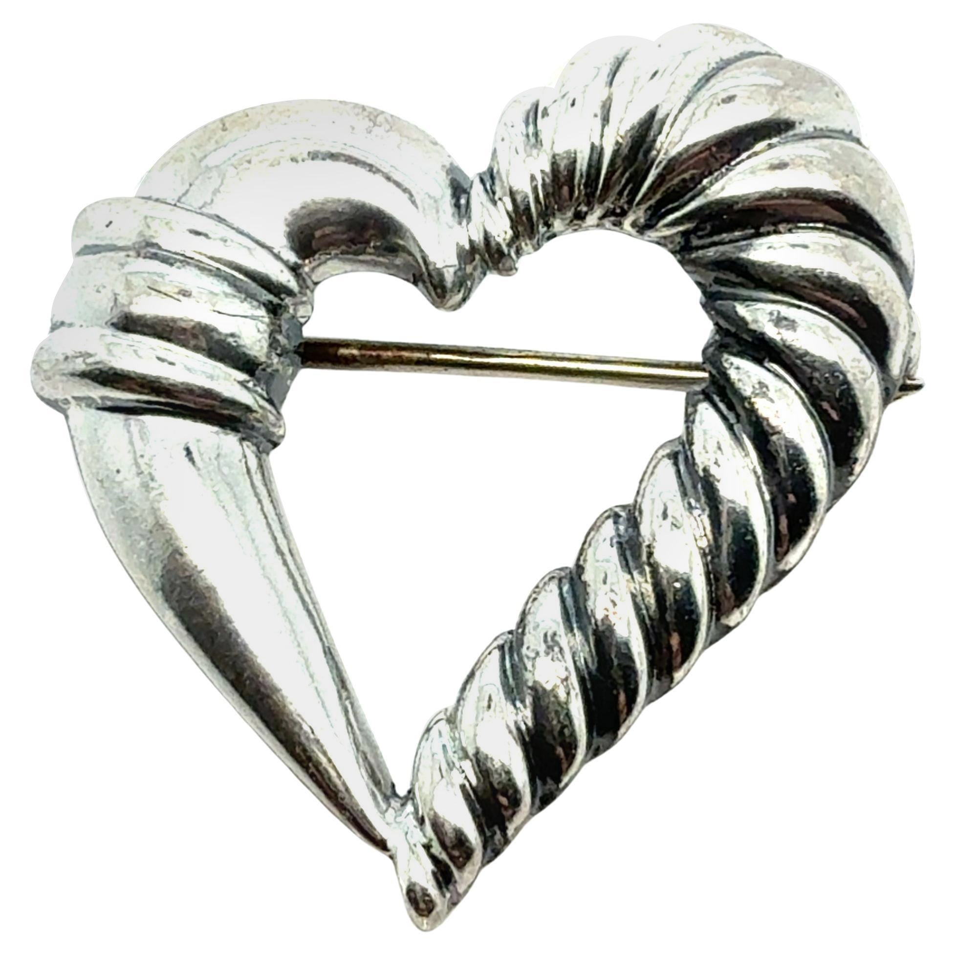 Tiffany
Co Broche cœur de succession en argent sterling