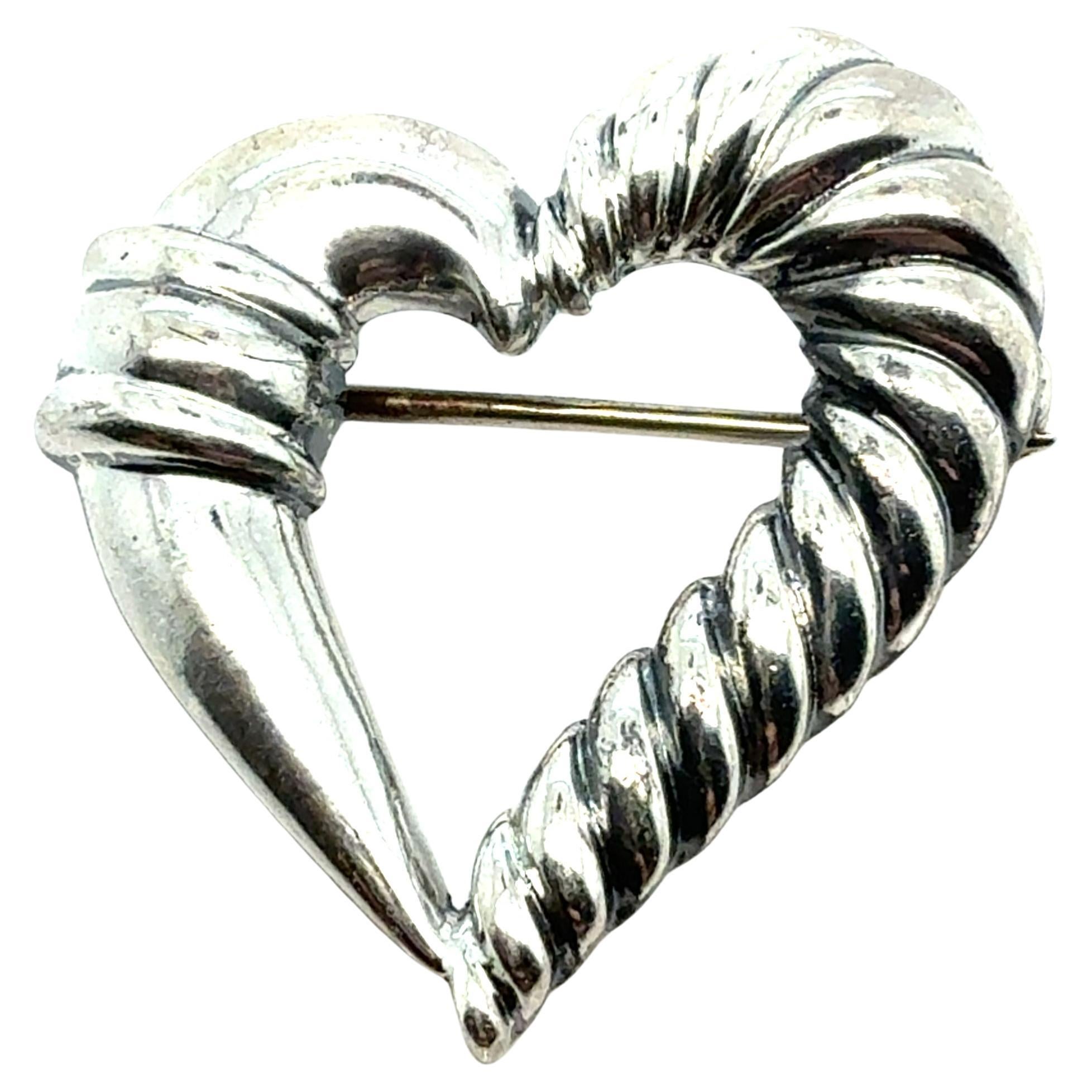 Tiffany
Co Broche cœur de succession en argent sterling